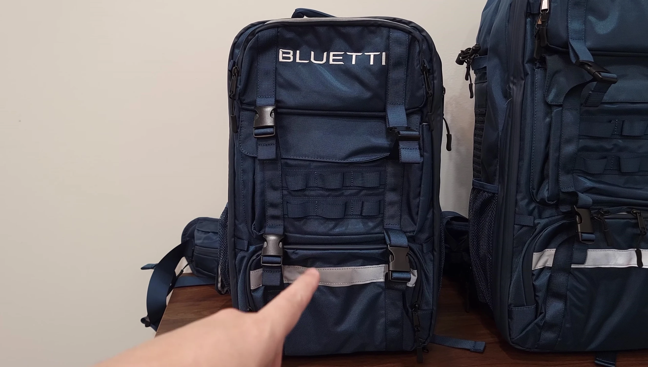 The solar panel attached to the backpack.