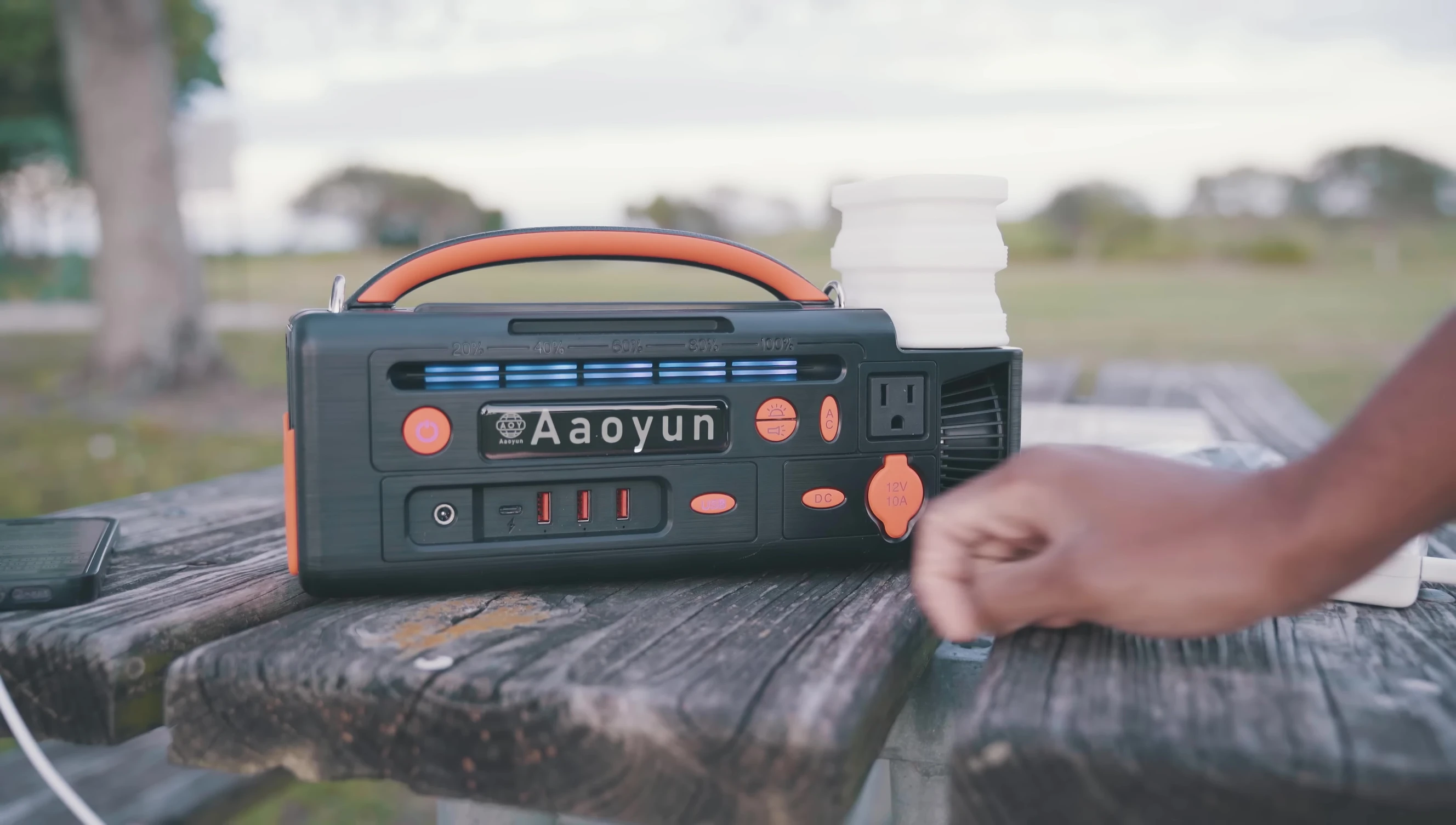 Close-up showing the various ports (USB, AC, DC).