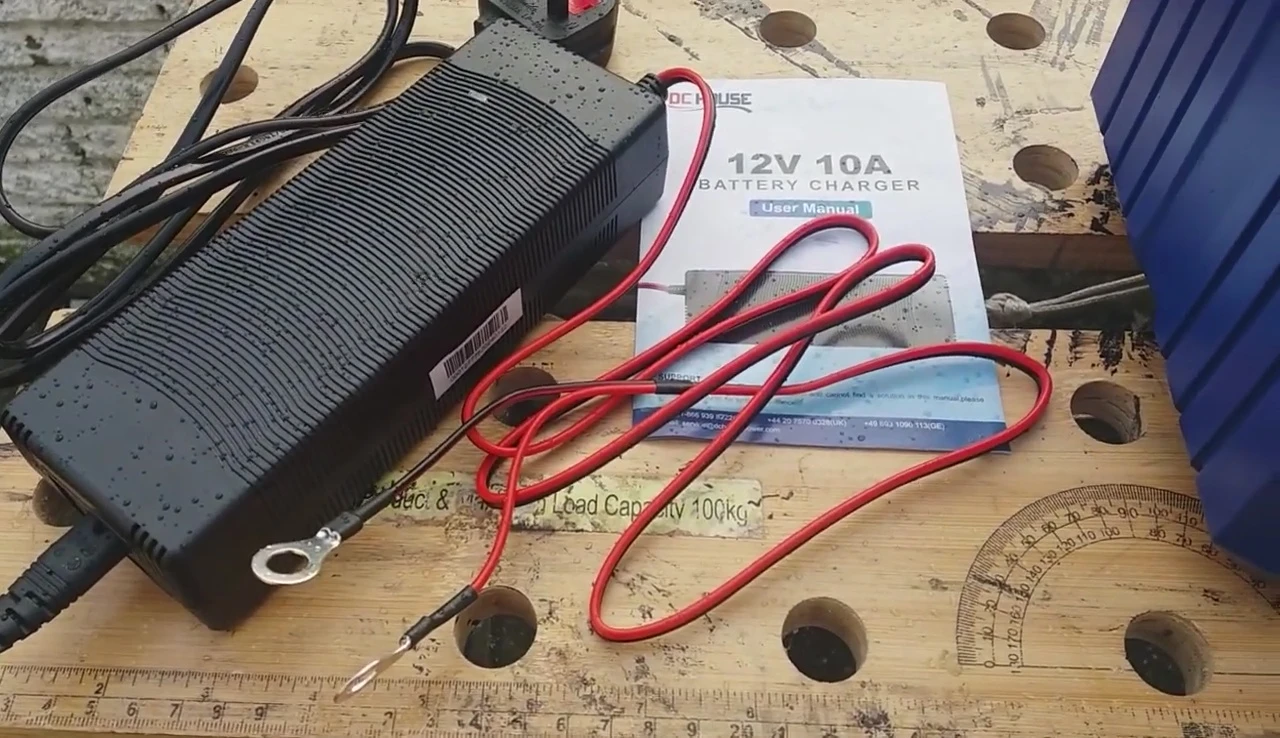 Close-up of the DC House 12V 10A battery-to-battery charger.