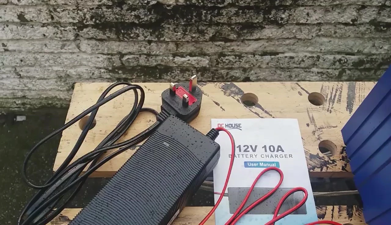 The charger plugged into a power outlet.