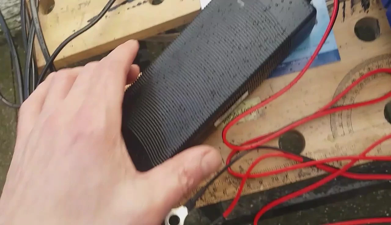 Final shot of the battery and charger together, highlighting their integration.