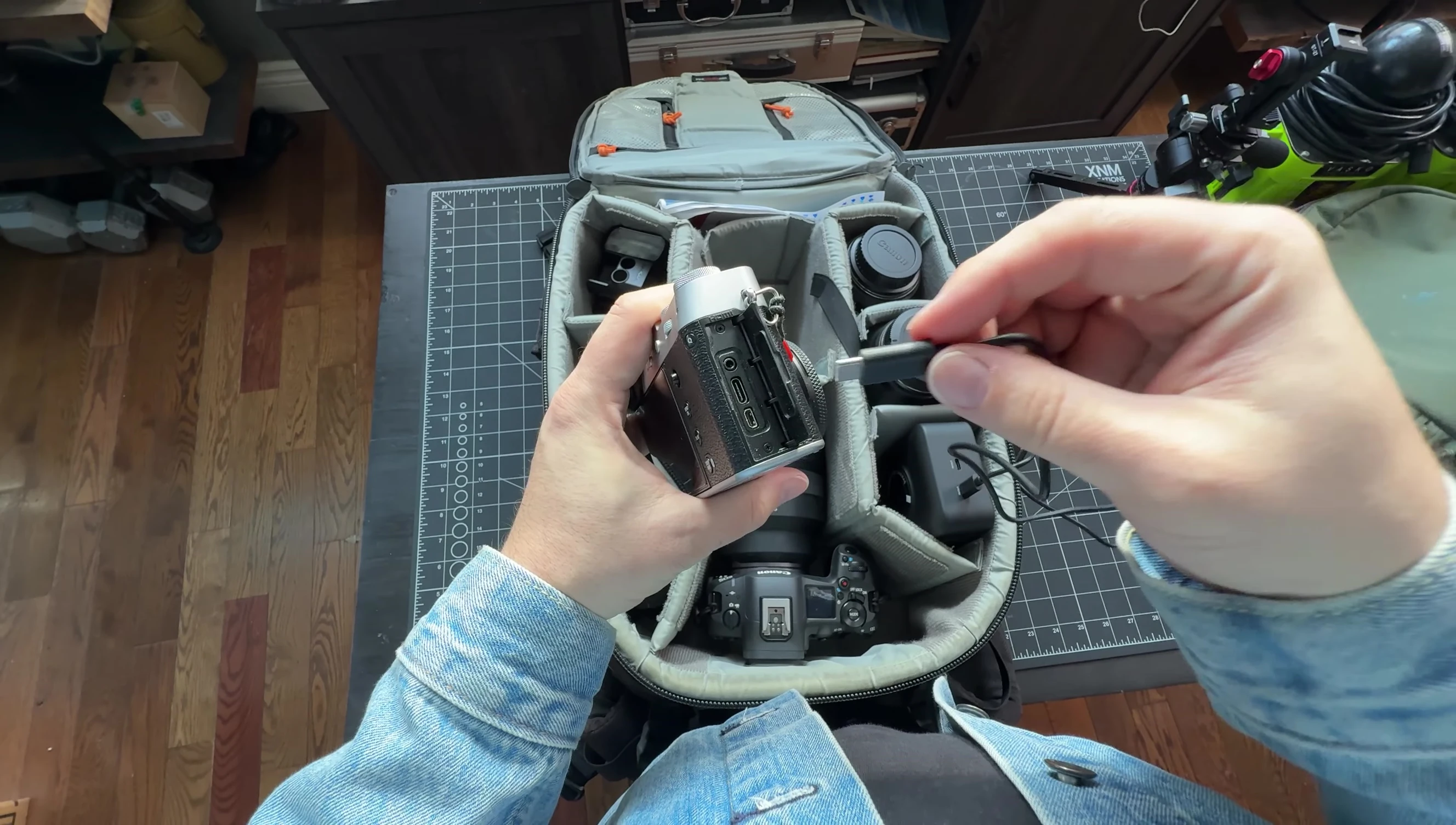 The LLANO charger plugged into a wall outlet.