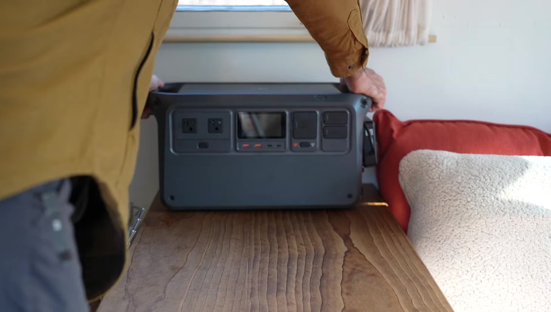 Close-up of the DJI Power 1000 power station, showing its design and display.