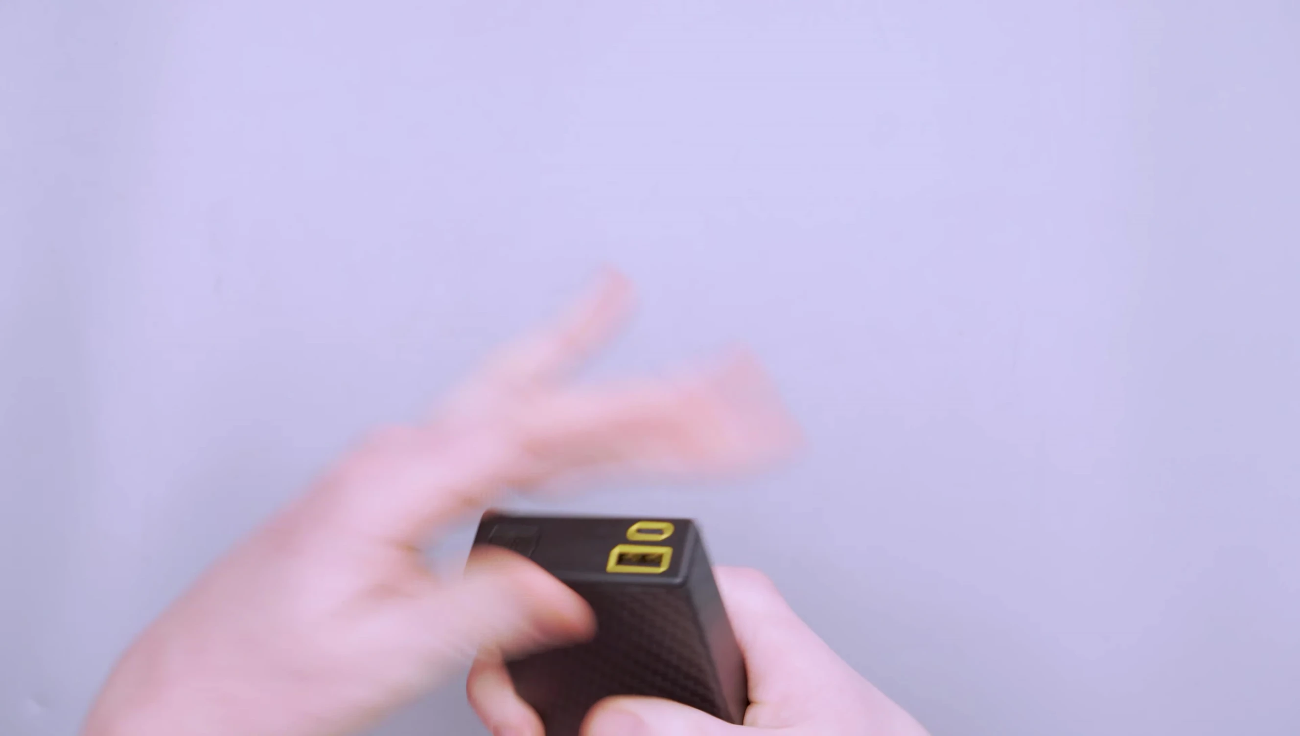 The NITECORE Carbo 20000 in the reviewer's hand.