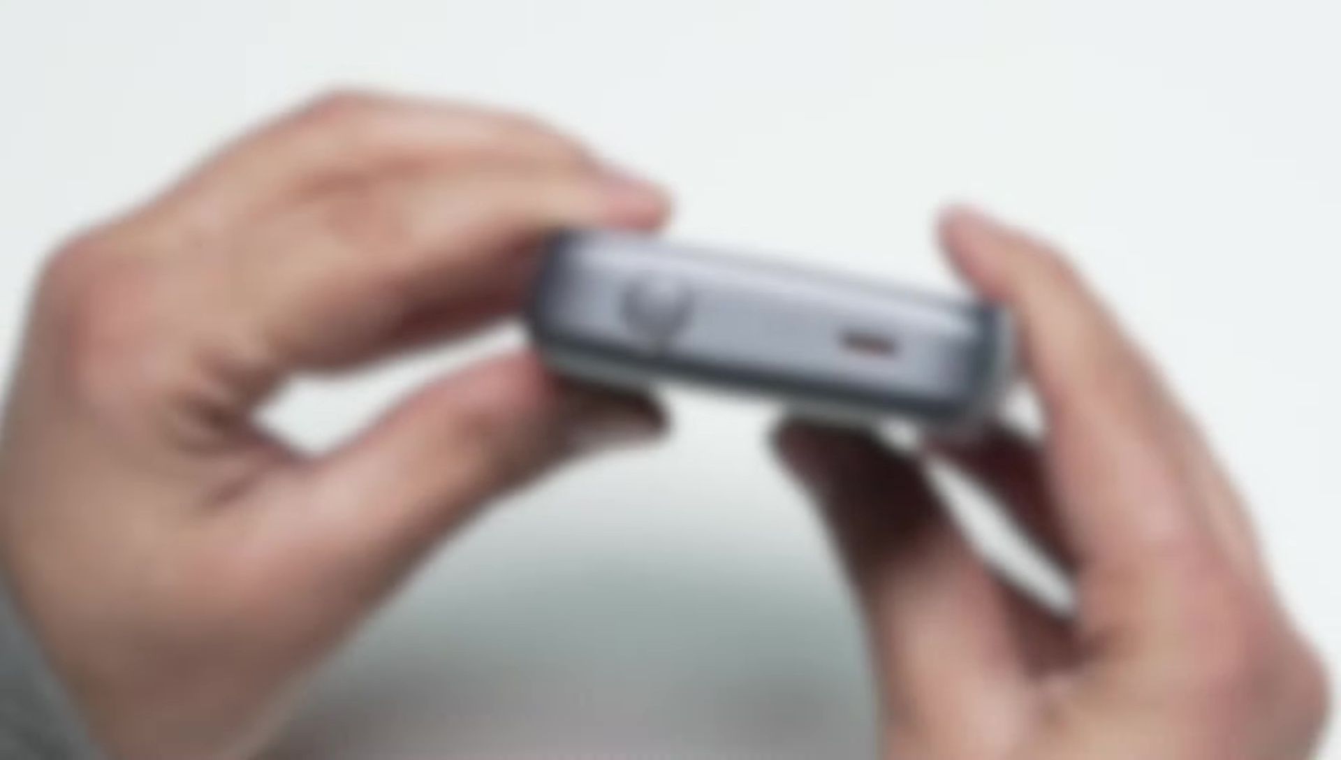 Close-up of the power button and LED indicators.