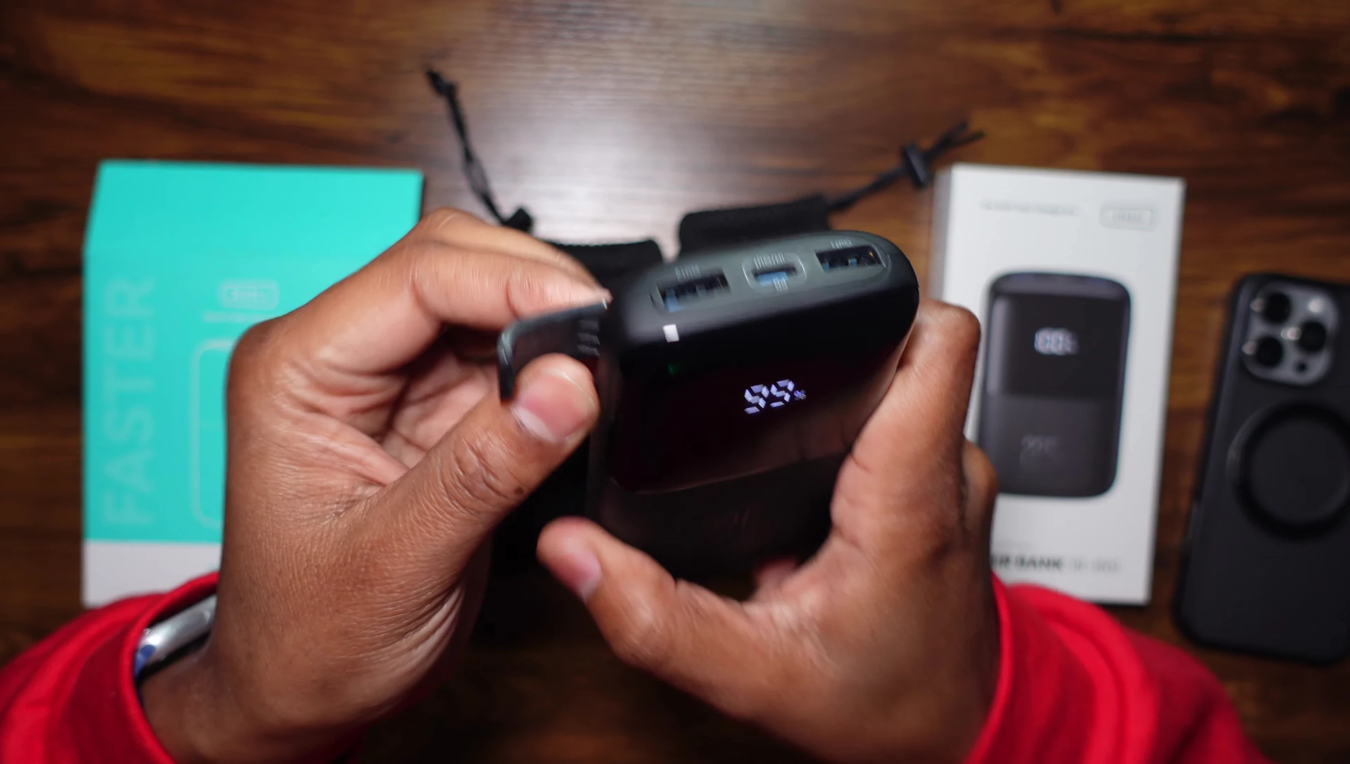 Showcase of the stand feature on the smaller power bank.