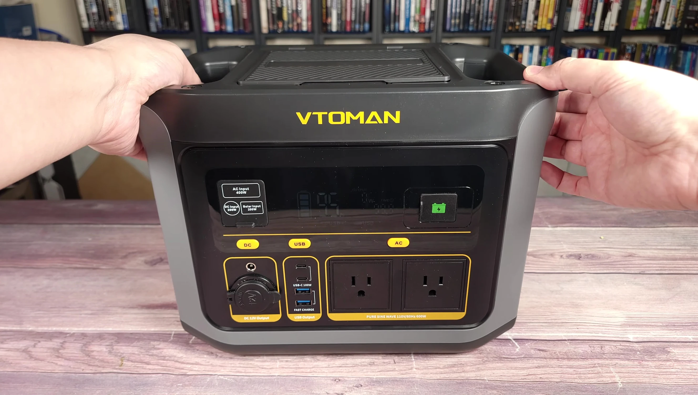 Close-up of the VTOMAN FlashSpeed 600 power station showing its design and carrying handles.