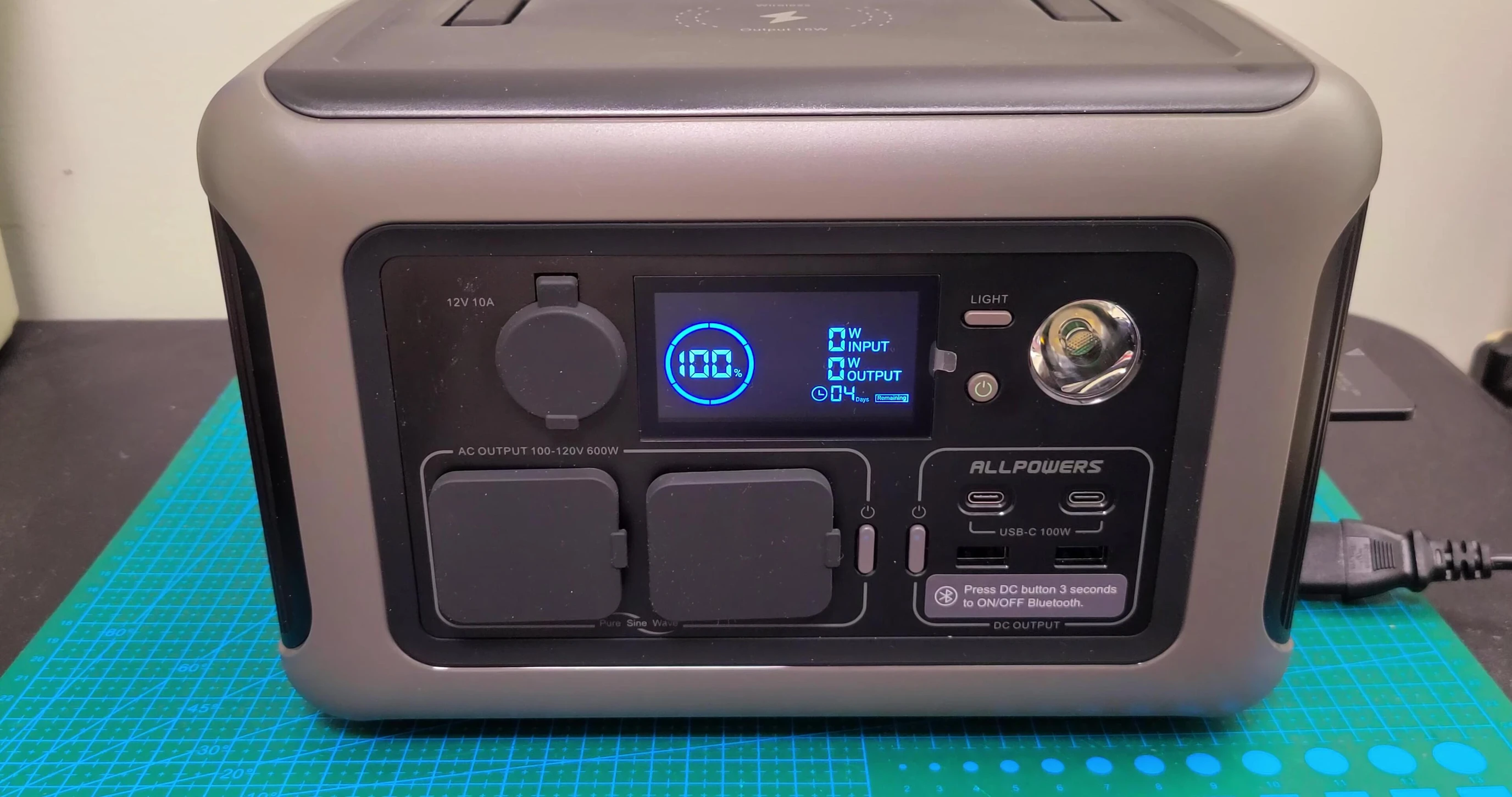 Wireless charging port and other output ports.