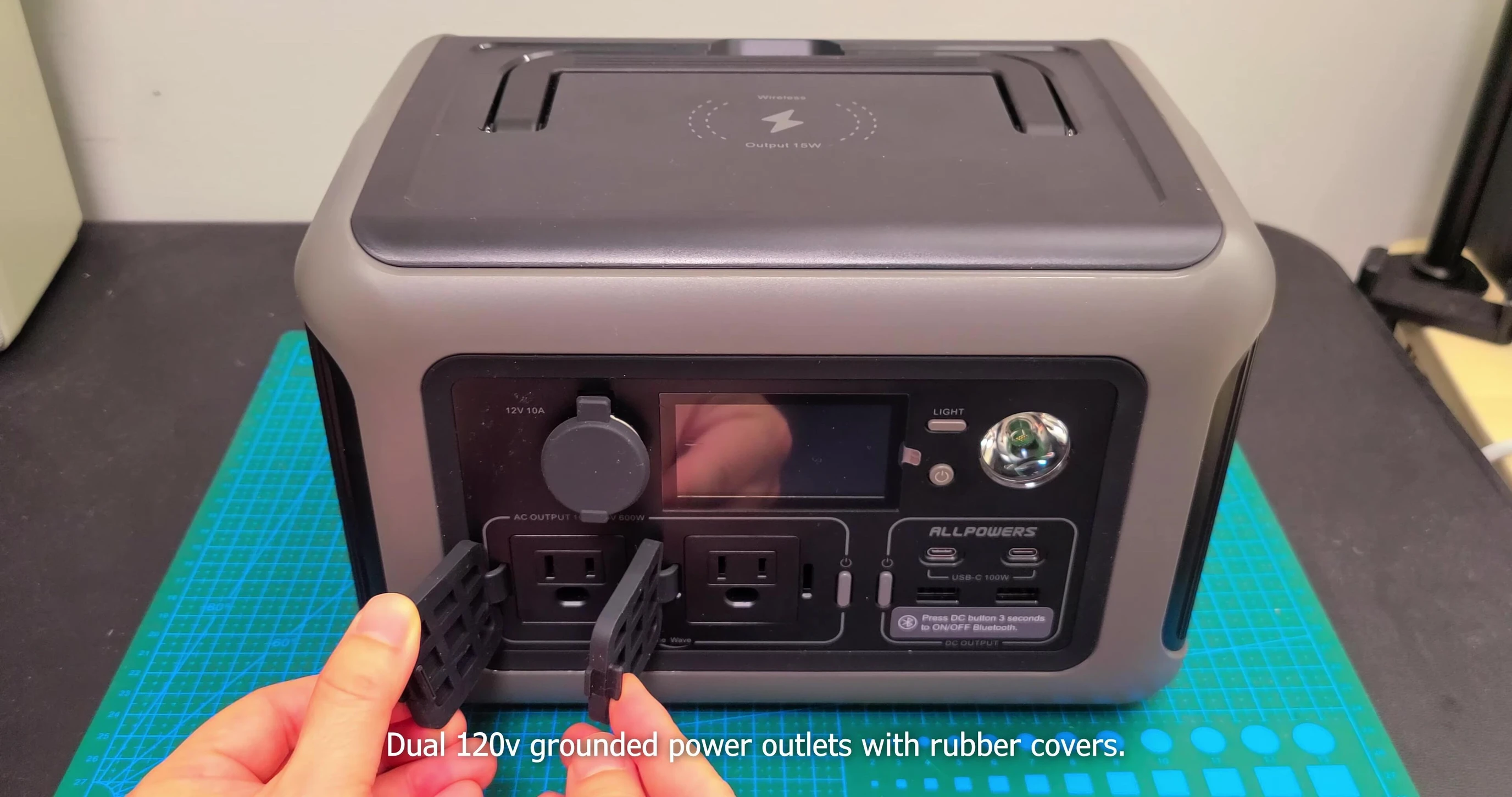 Close-up of various ports and the LED light.