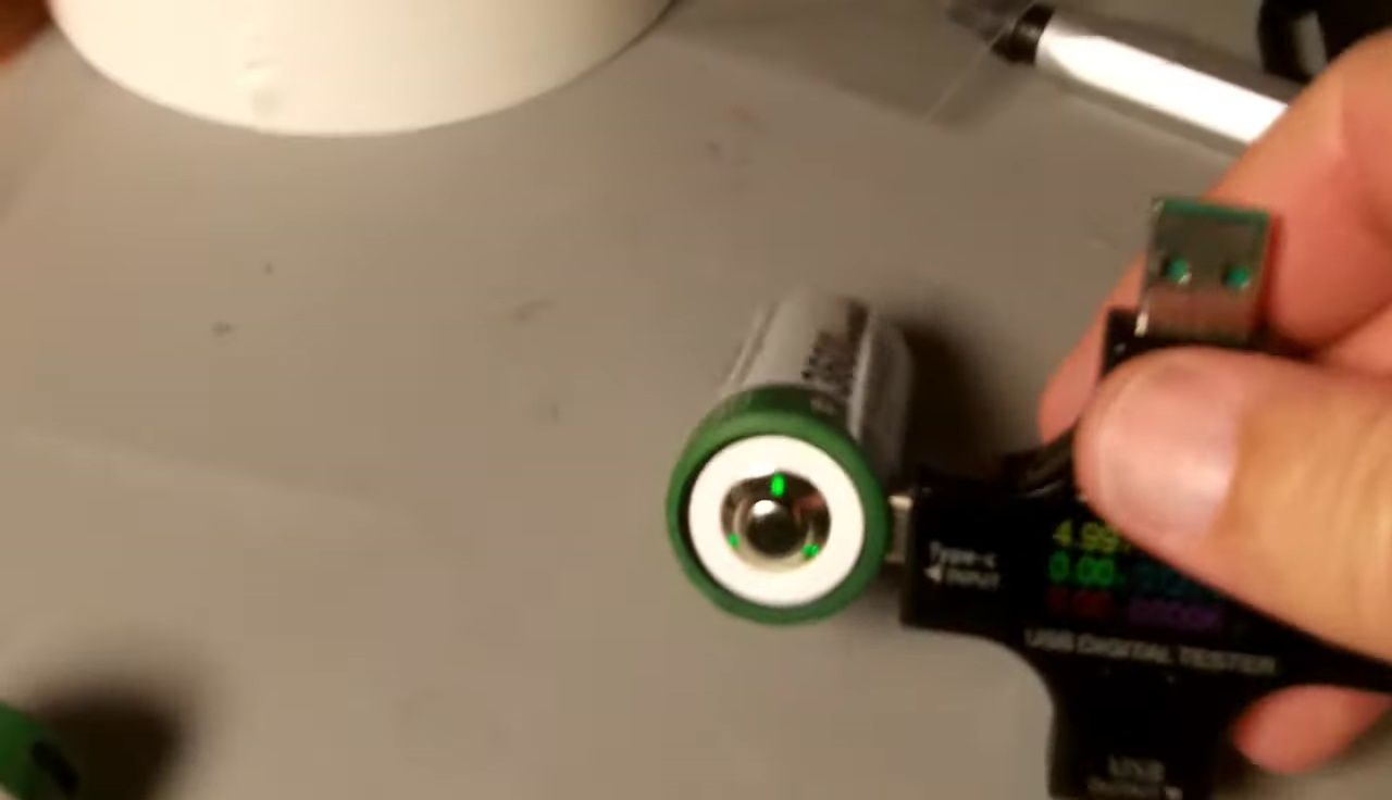 Fully charged battery with solid green LED indicators