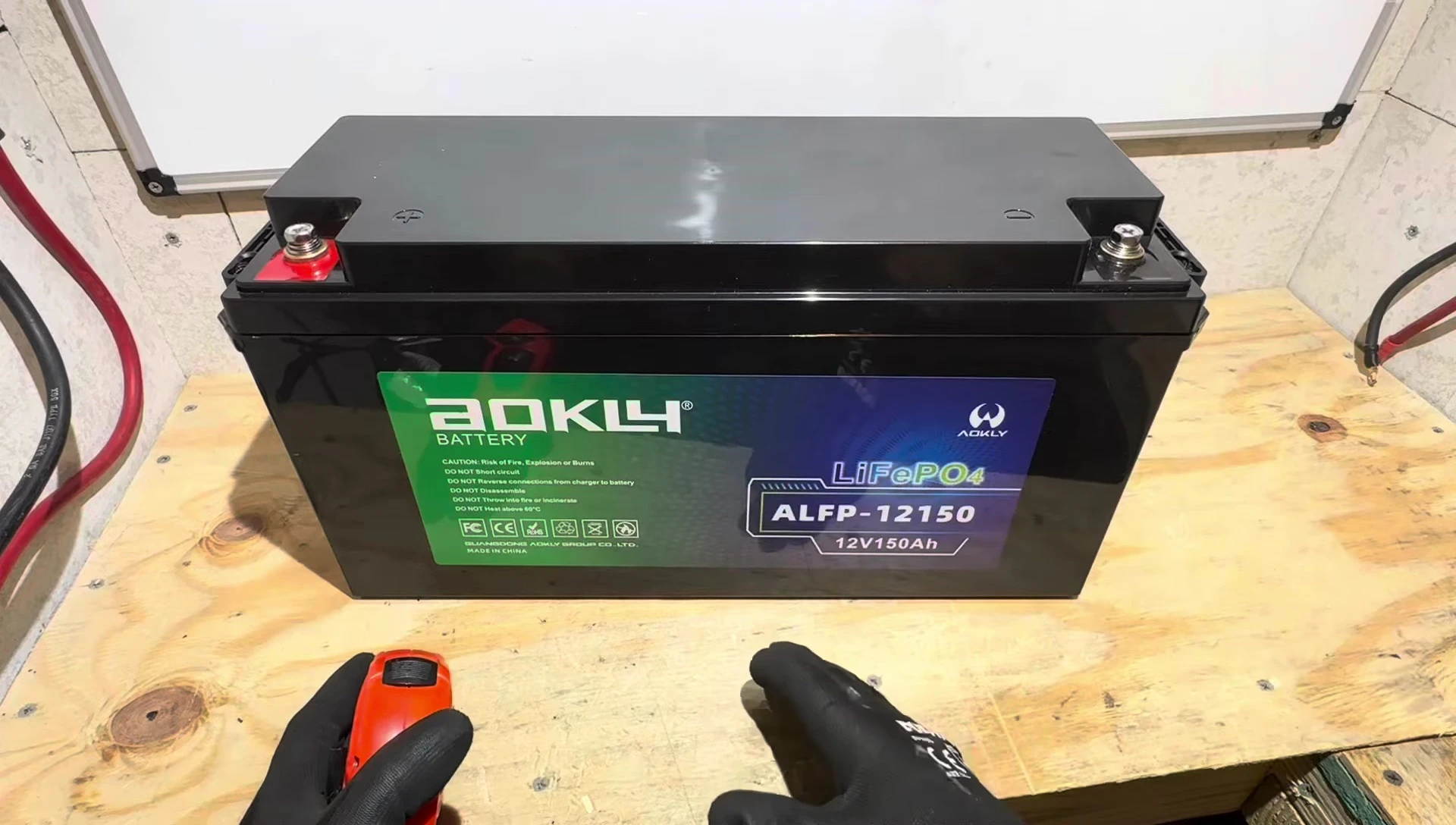 AOKLY battery showing the unique case size