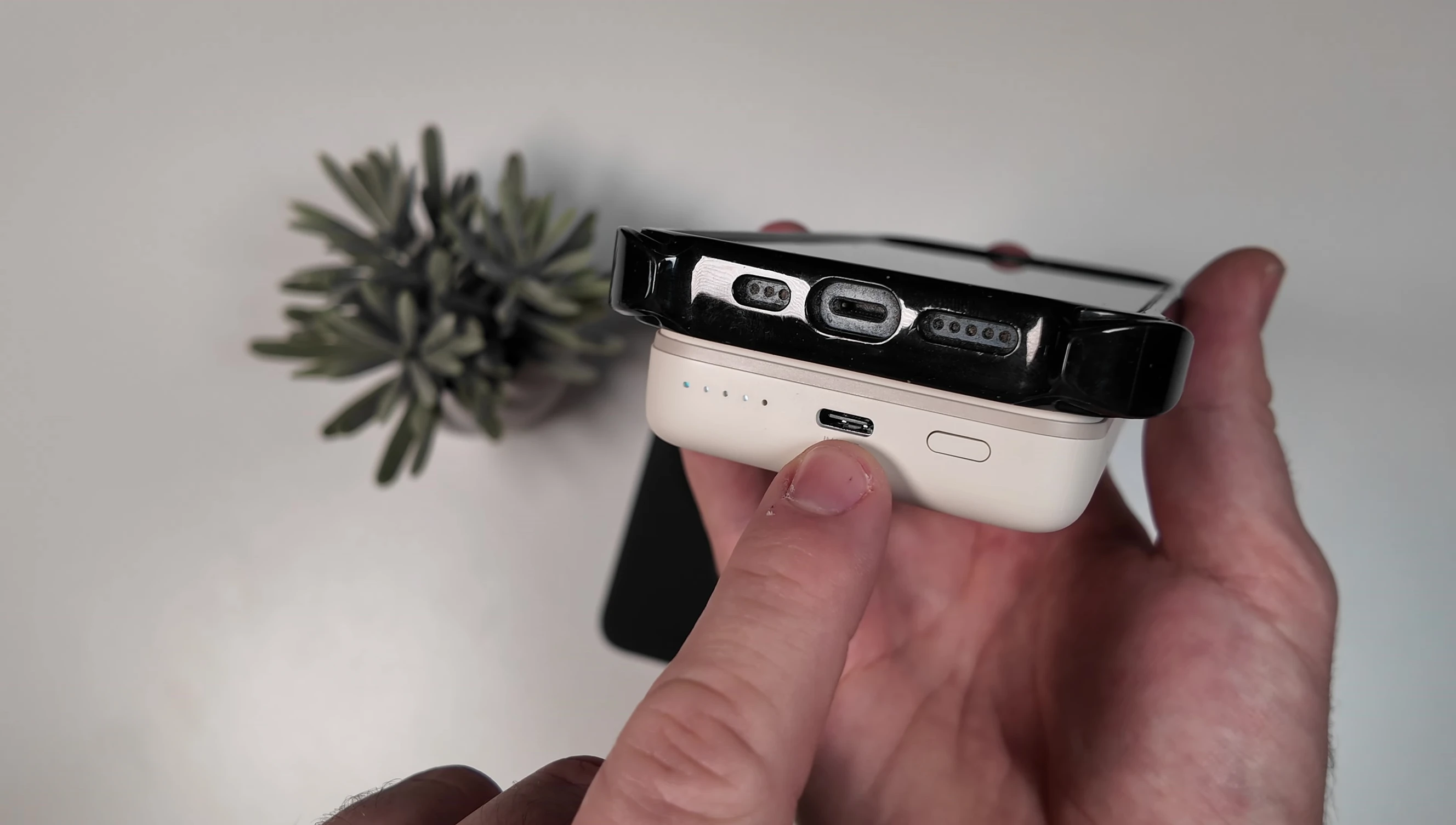 Showing the use of a USB-C cable for charging