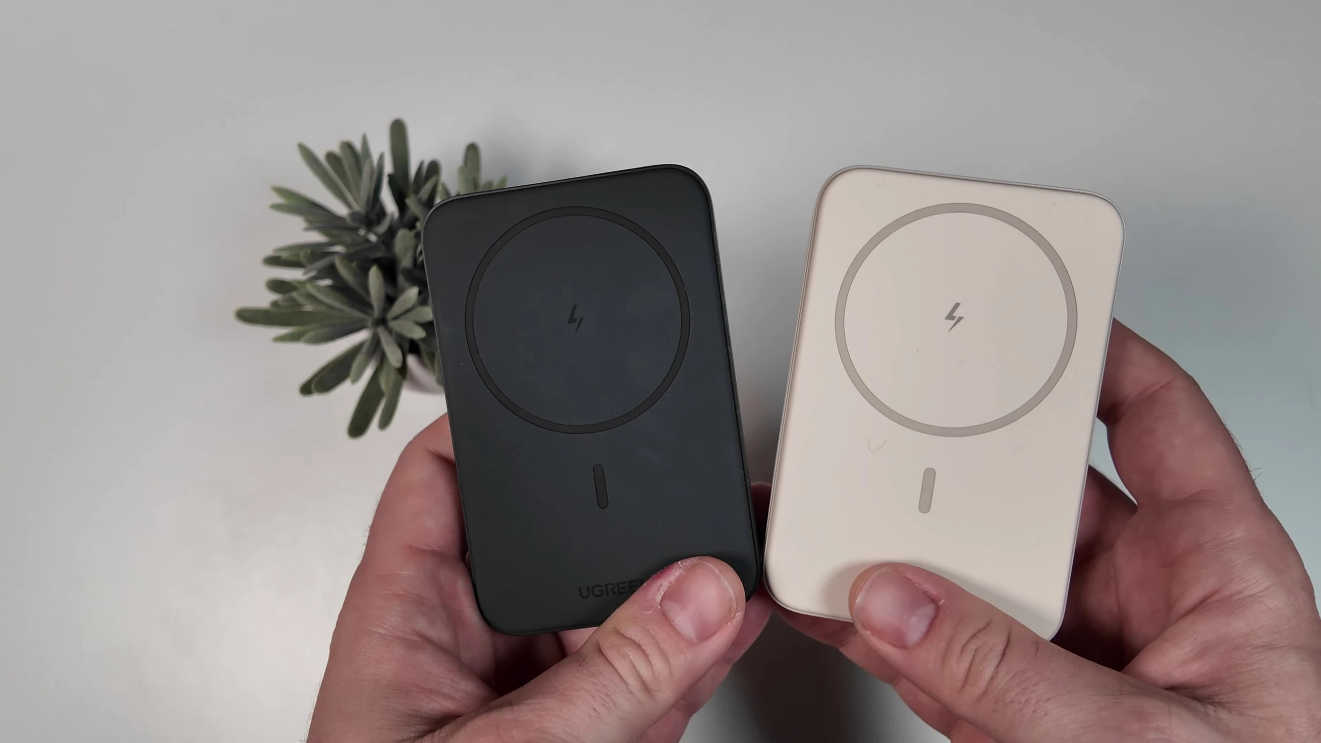 Close-up of the white and black UGREEN MagSafe power banks