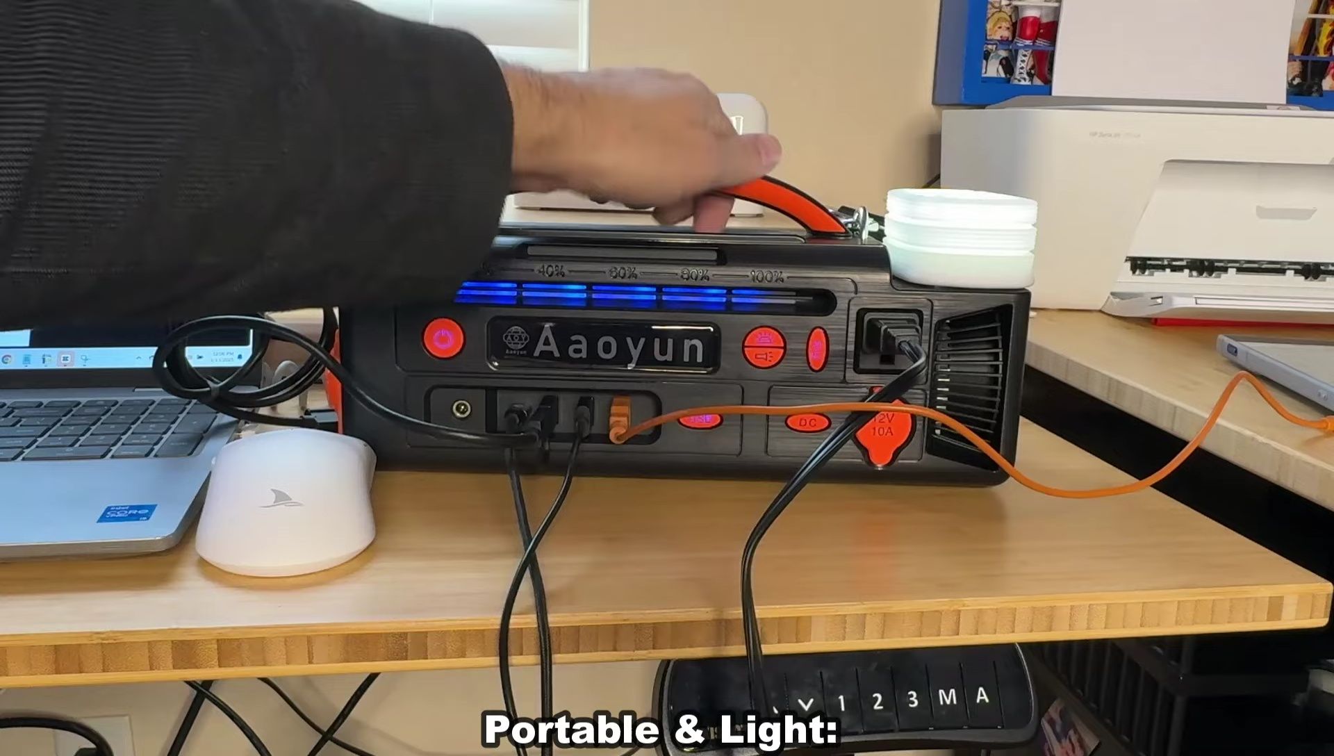 The power station with its carrying strap