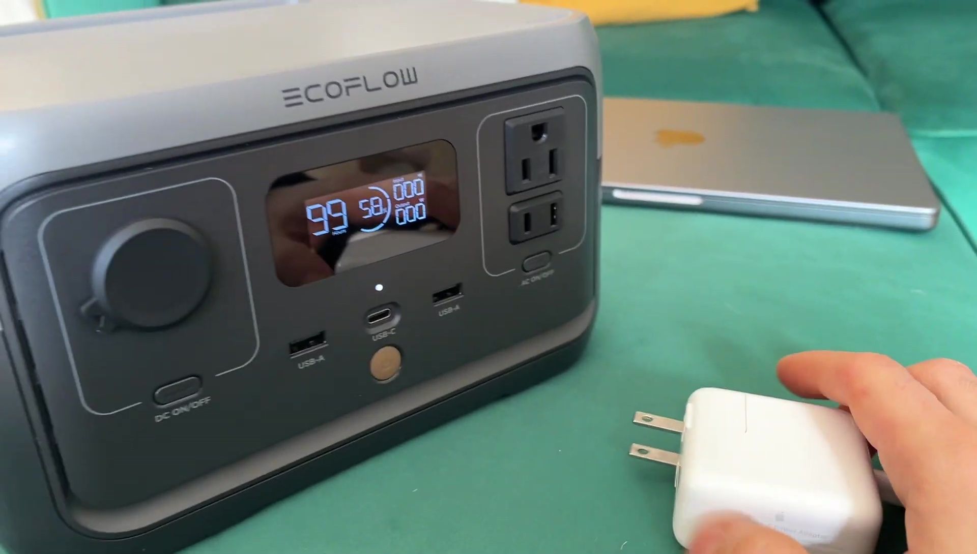 The EcoFlow River 2 powering a laptop.