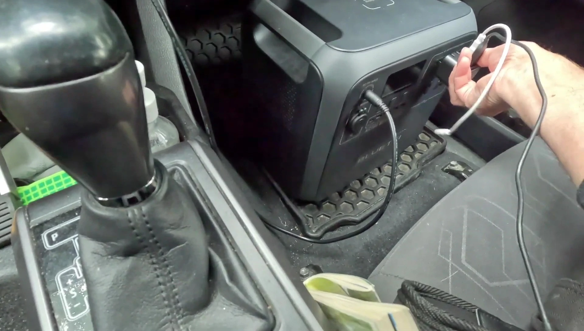Various devices plugged into the Bluetti AC180