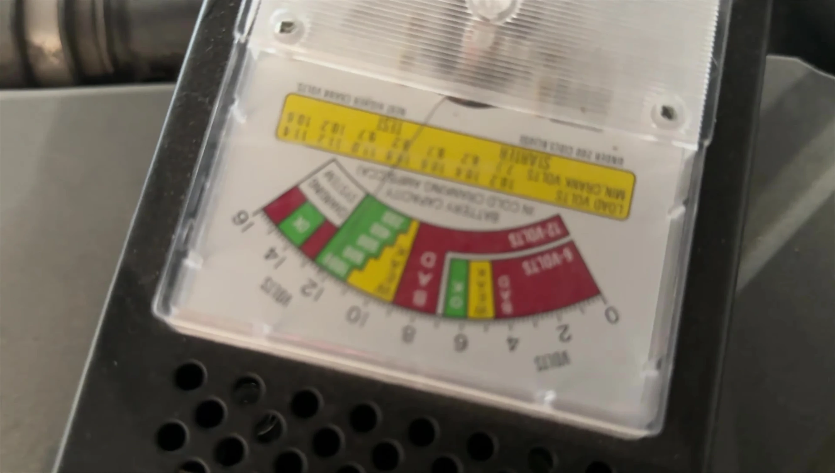 Battery tester showing 12 volts after charging