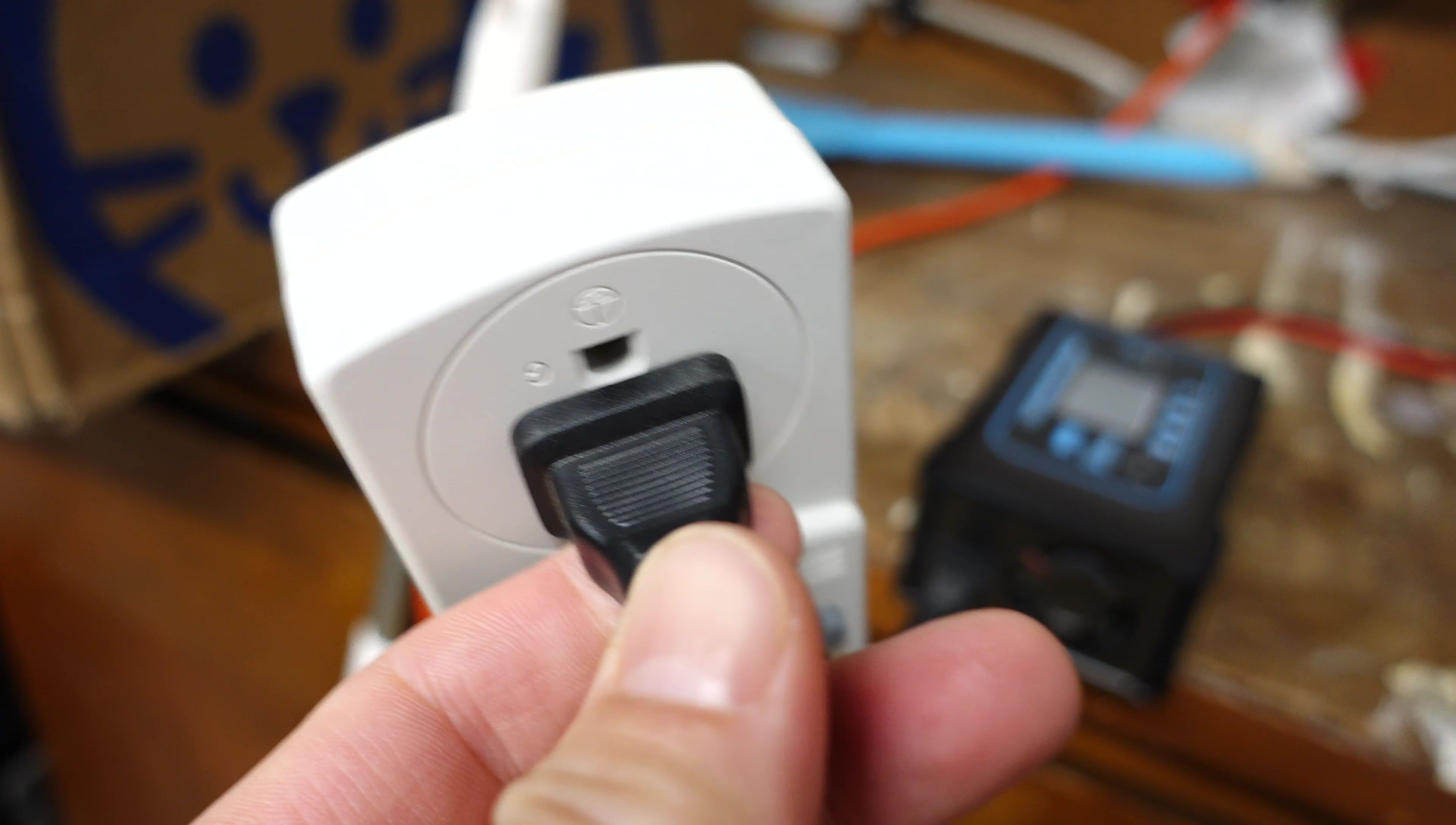 Setup for charging the battery with power meter for efficient tracking.