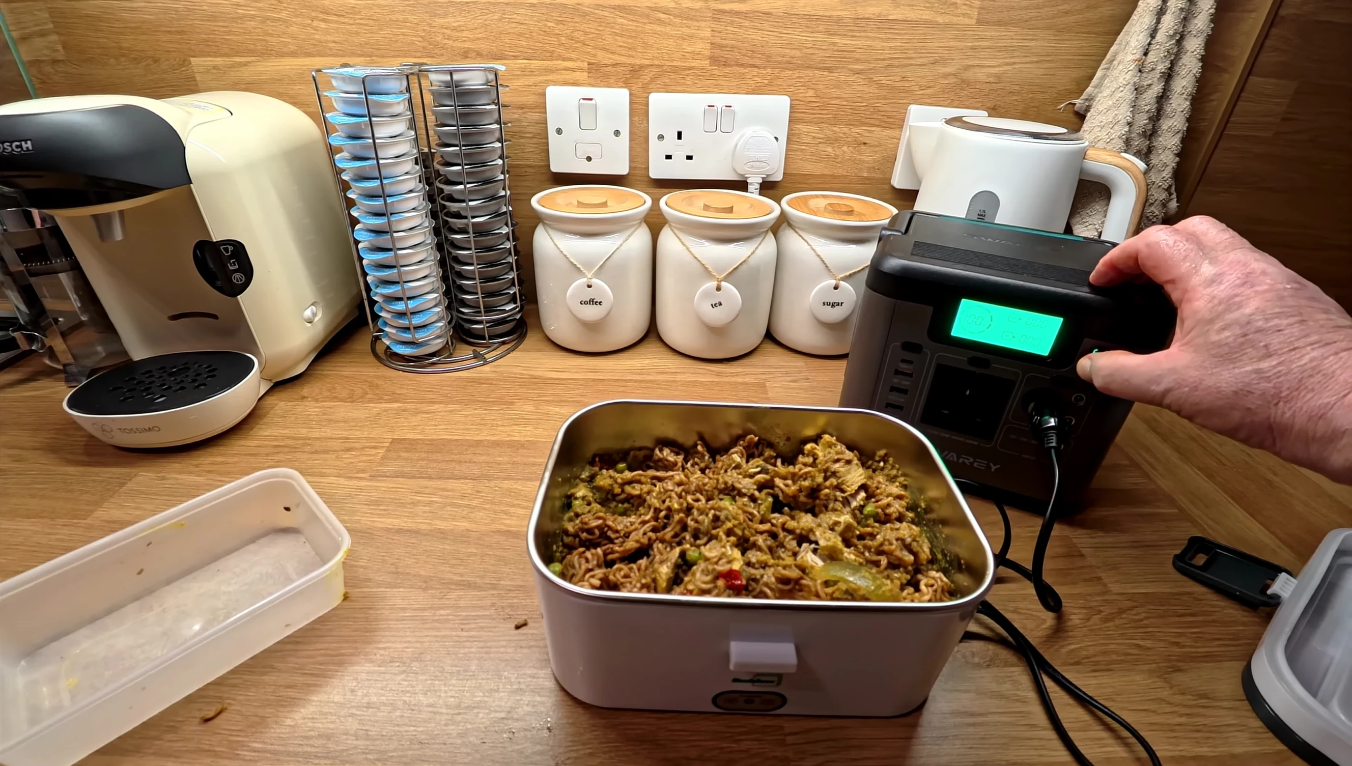 The 12V power station connected to the lunch box.