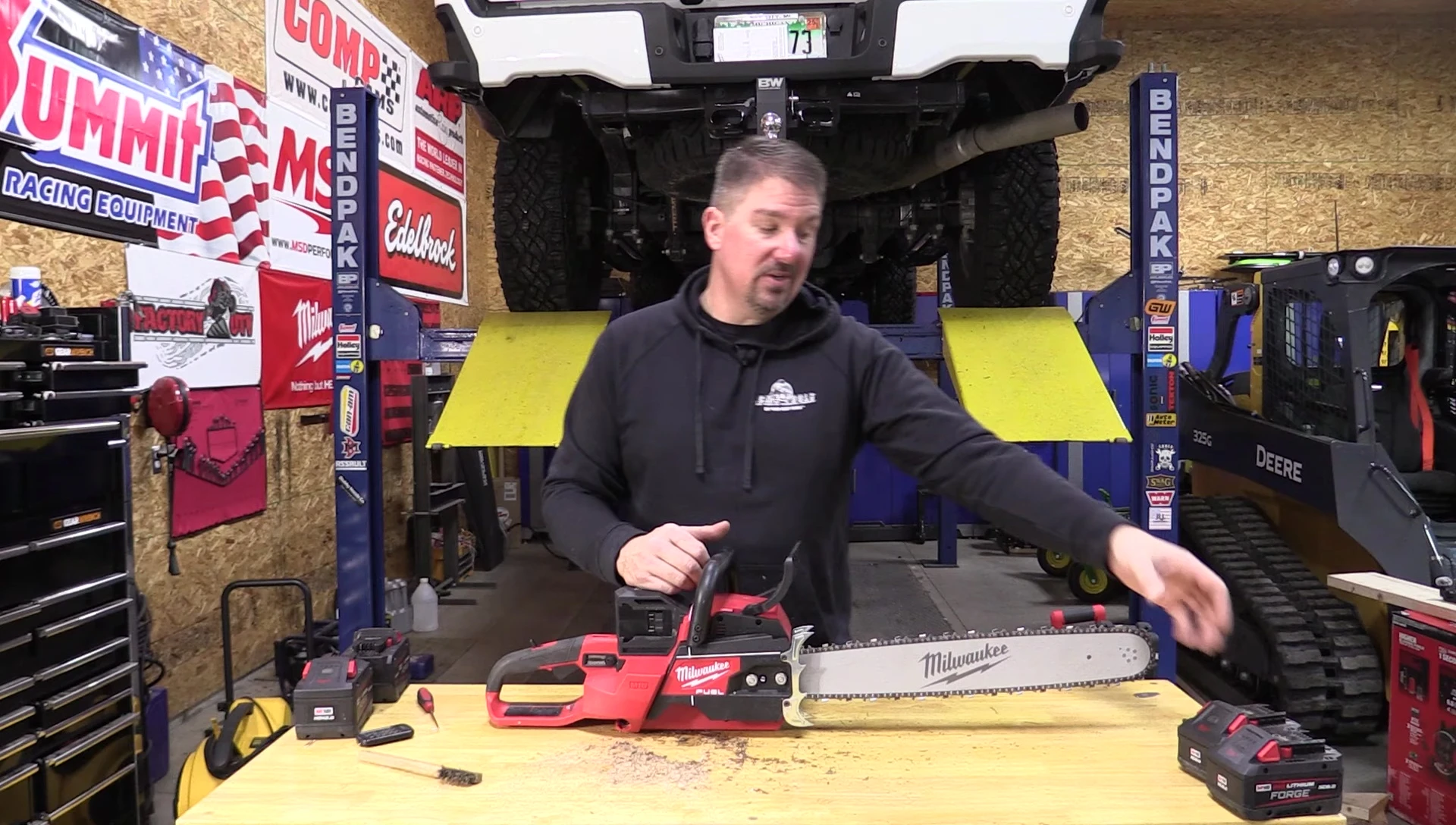 The reviewer summarizing the cost and performance of the chainsaw.