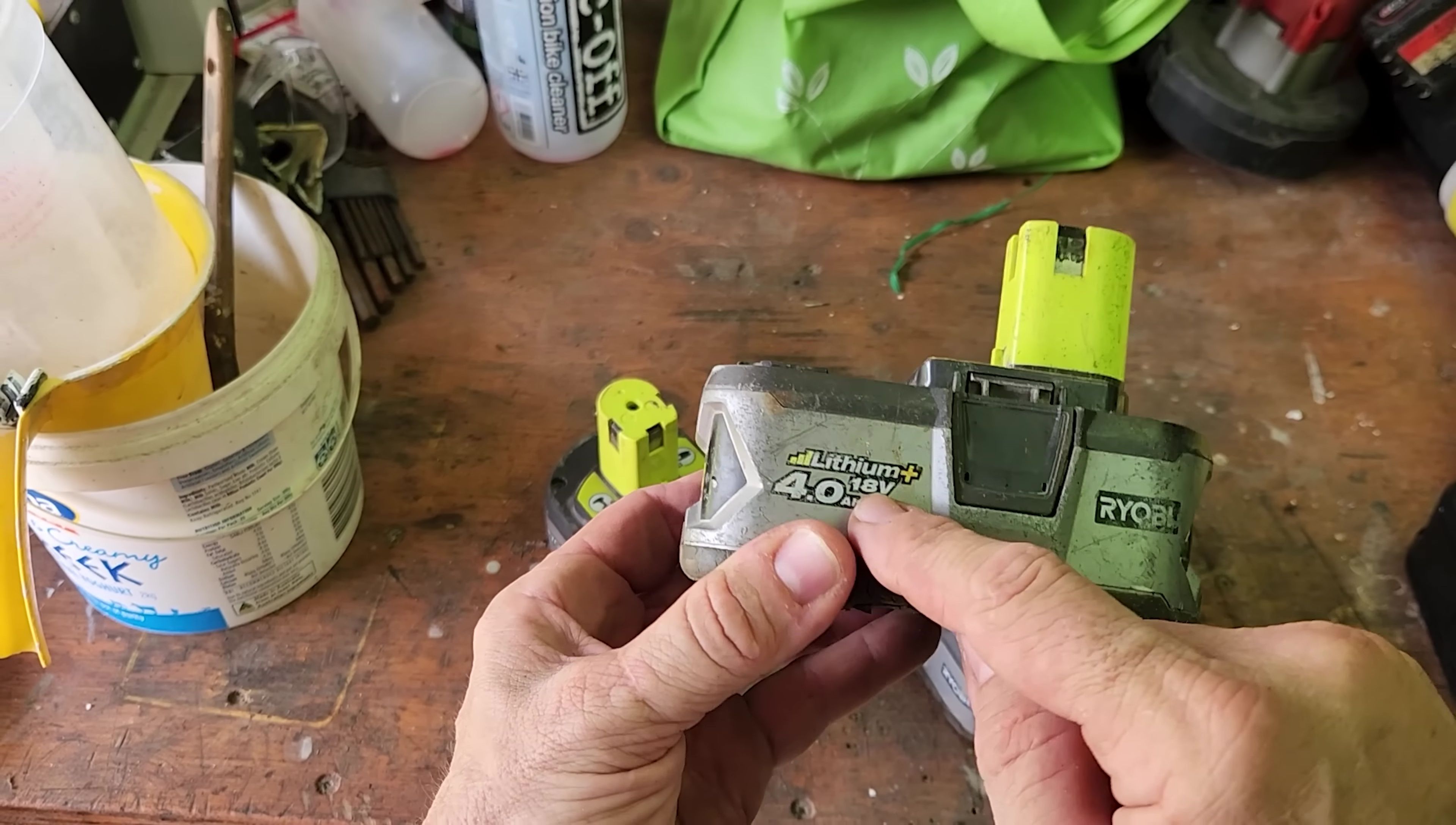 Screenshot showing the price tag of a genuine Ryobi 4 amp battery.