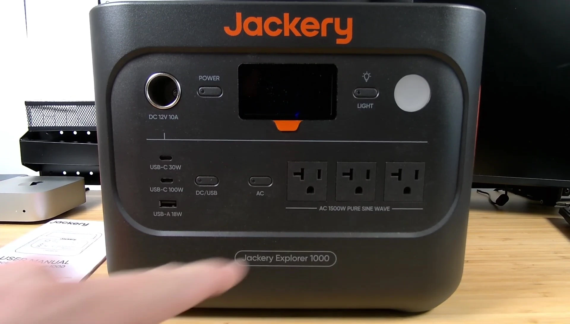 Close-up of the 1500W AC output specification on the device