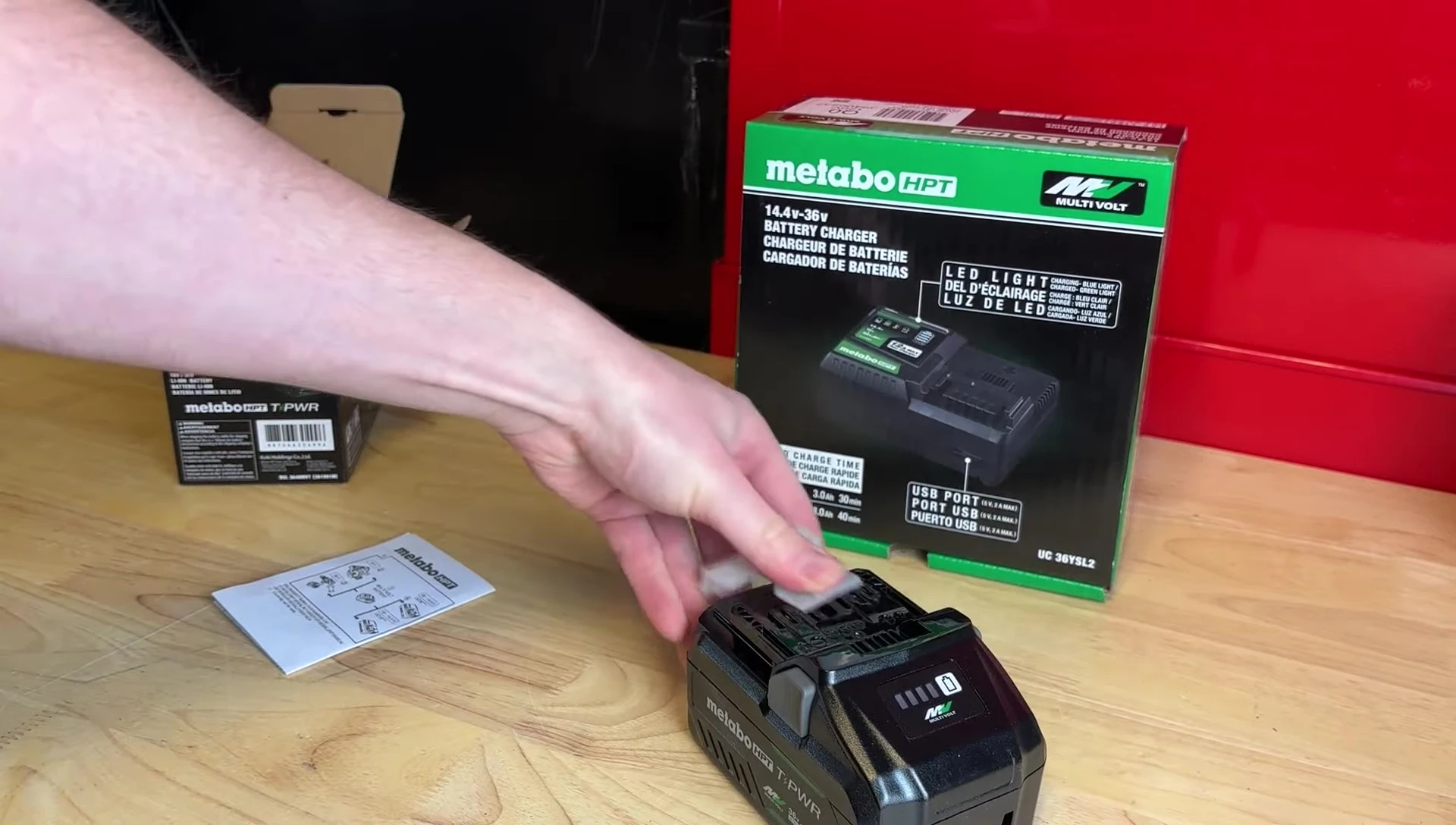 Weighing the new T-Power battery on a scale