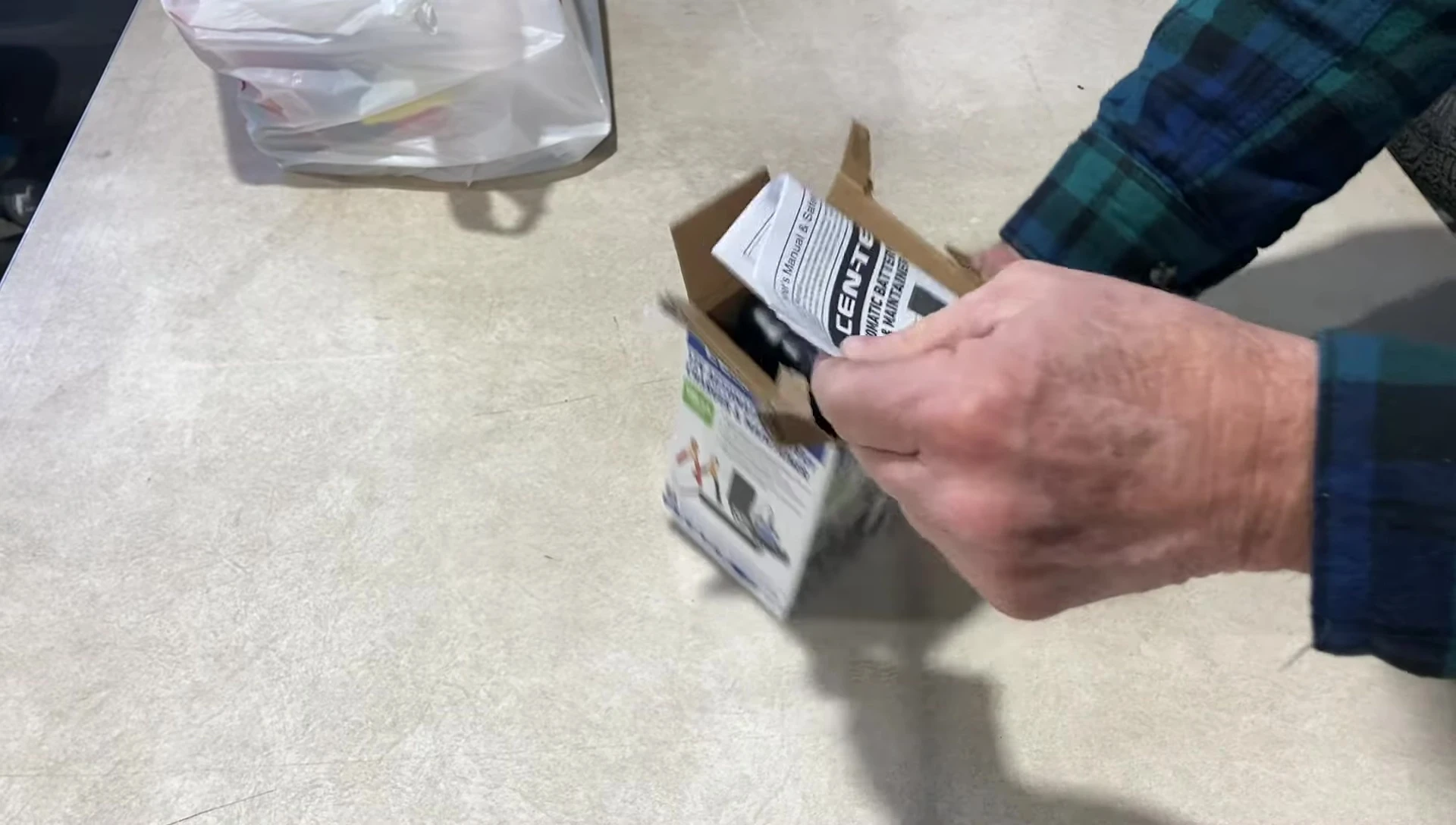 The battery tender being unboxed