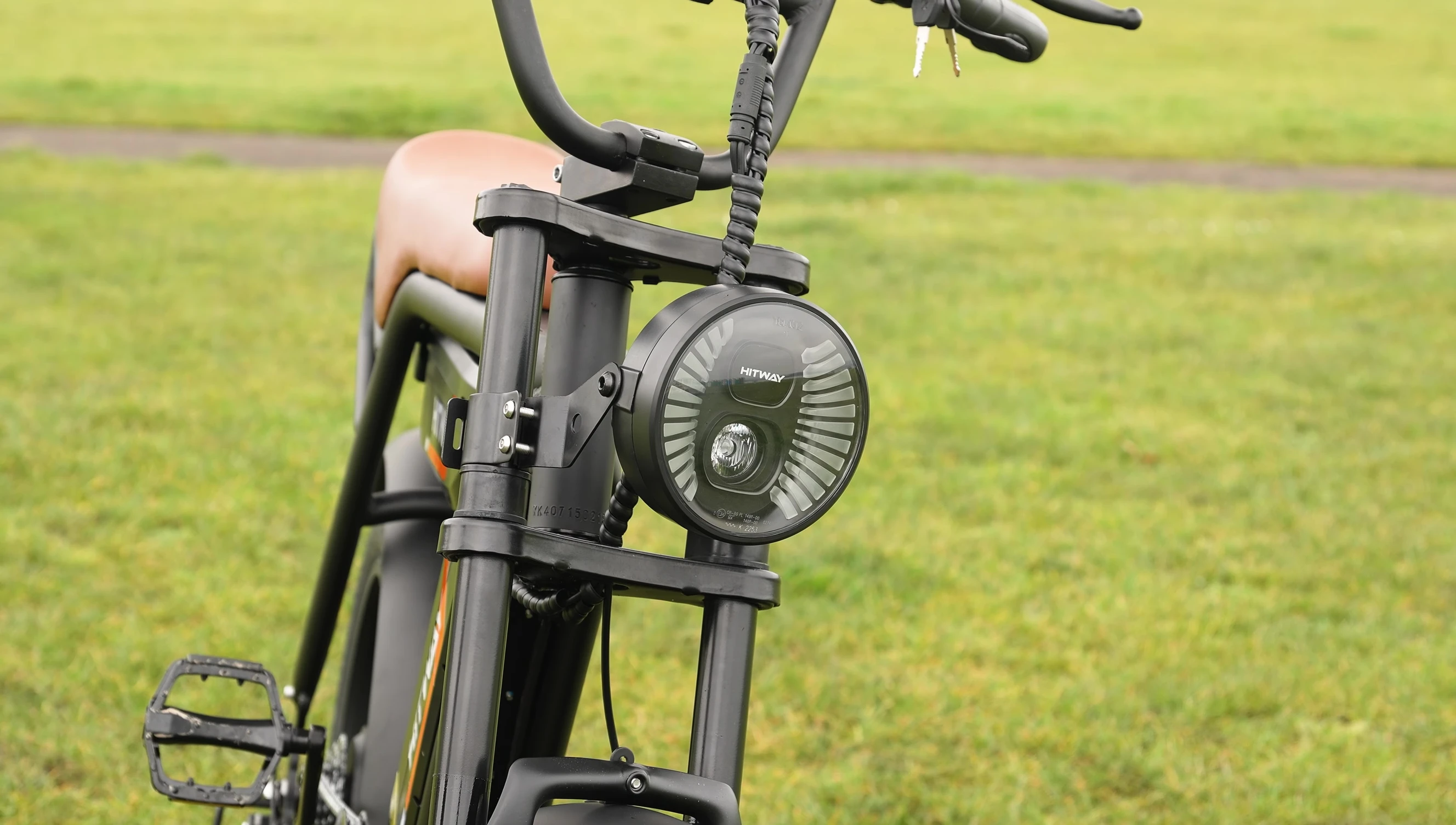 The bright dual headlights of the Hitway BK17.