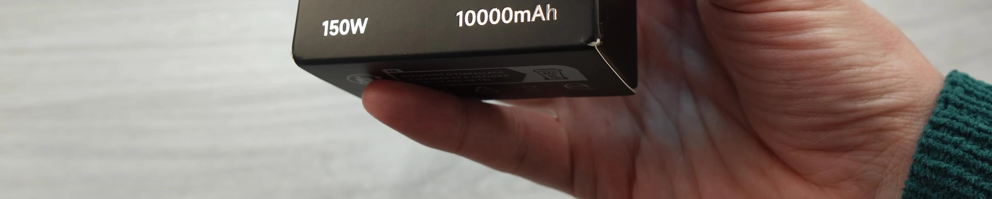 Close-up of the power bank's specifications, highlighting the mAh capacity.