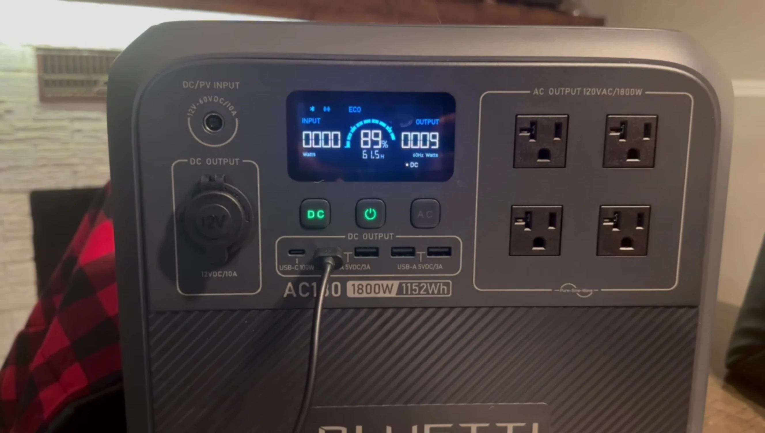 The box fan plugged into the Bluetti AC180