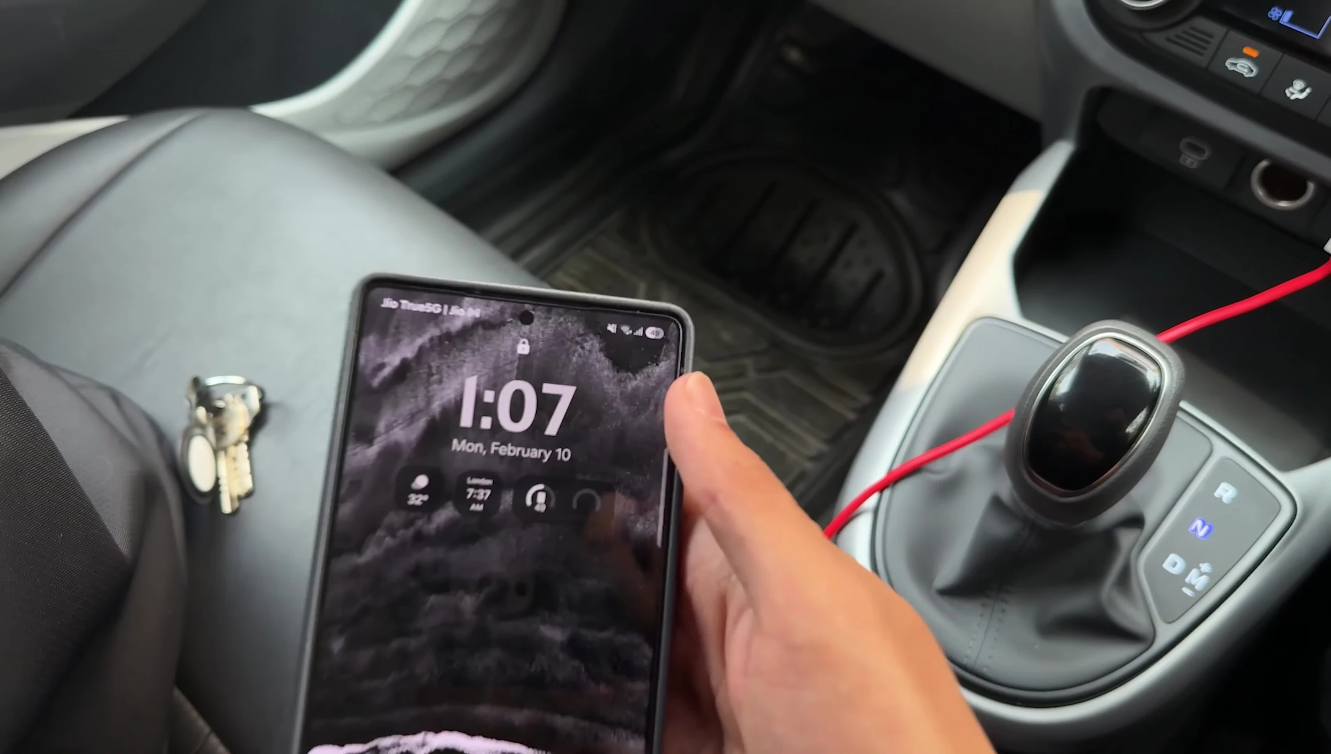 The vlogger checking his S25 Ultra's battery level.