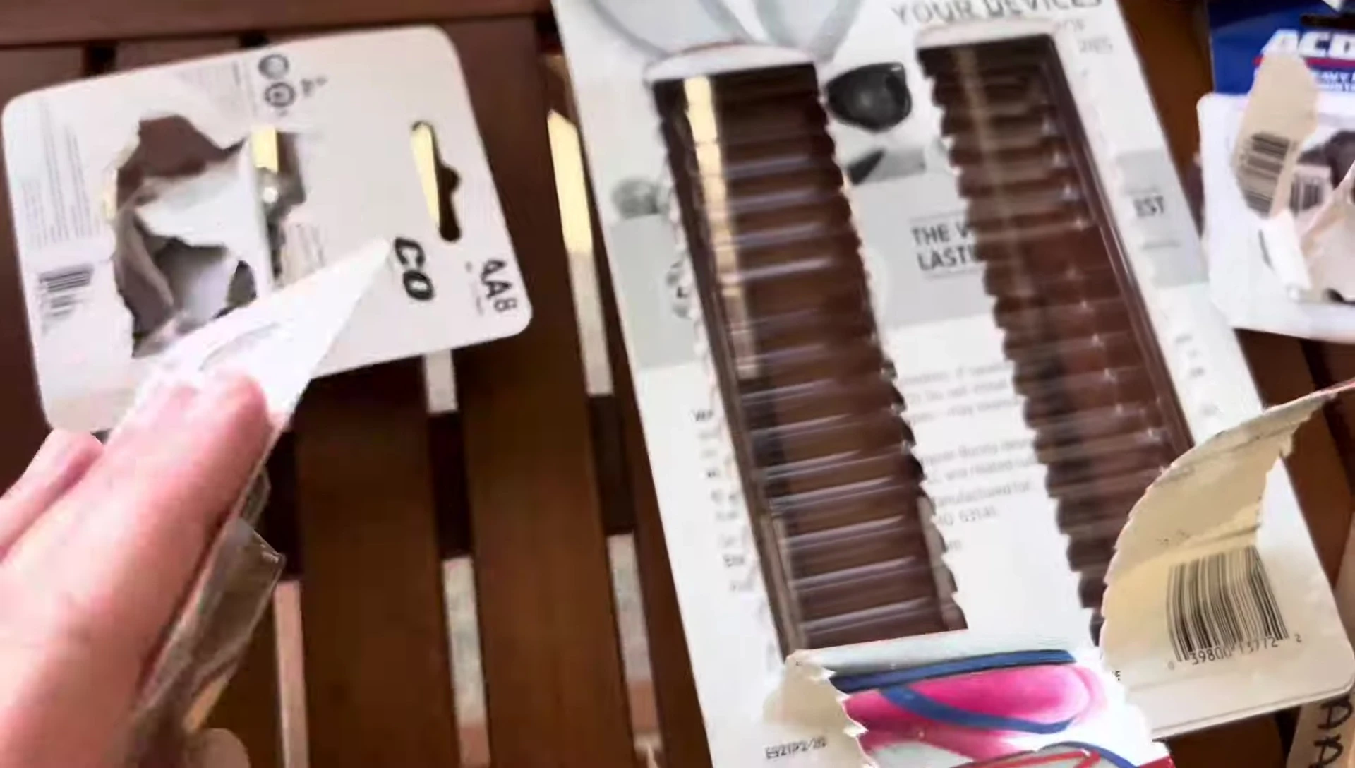 A pile of empty battery packaging, demonstrating the space saved.