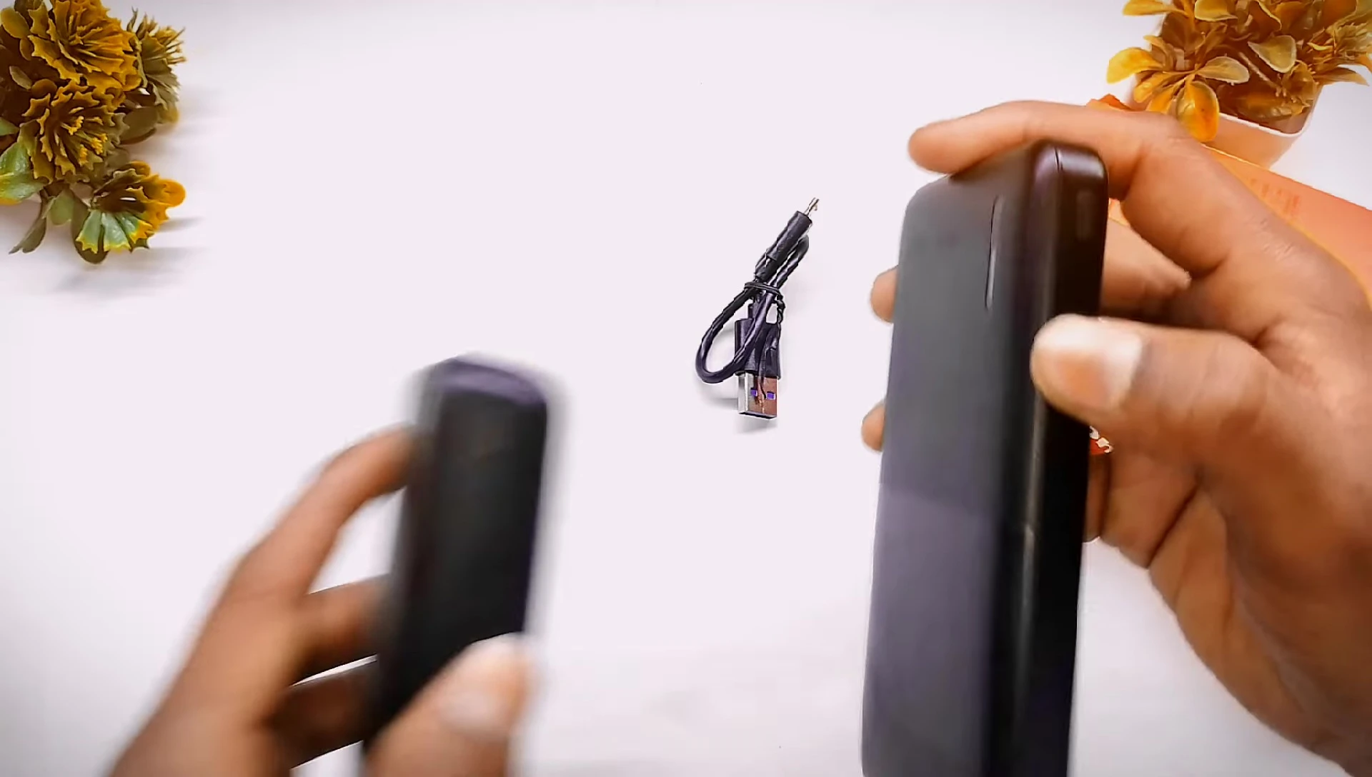 The power button on the power bank