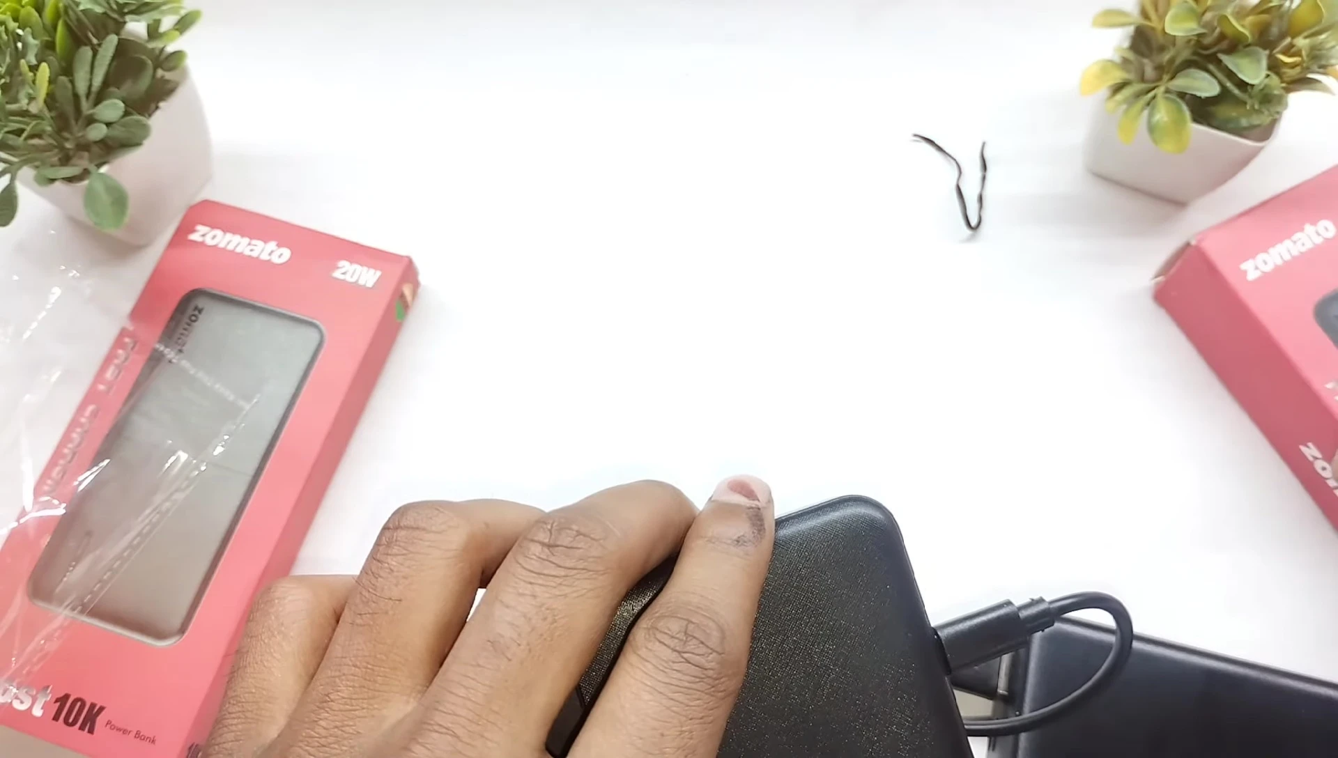 Power bank charging with LED indicators visible