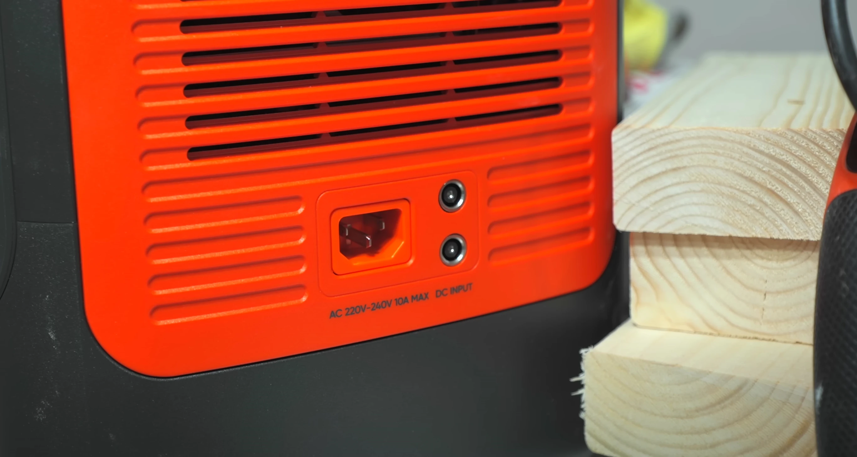 Image showcasing the multiple charging ports on the side of the unit.