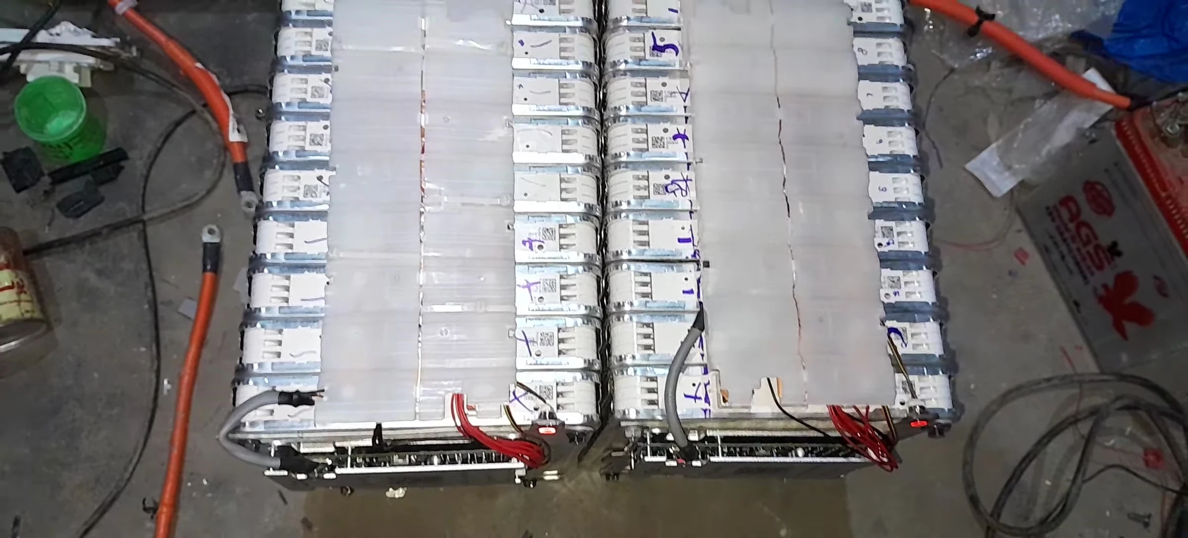 The builder discussing the applications of the batteries.