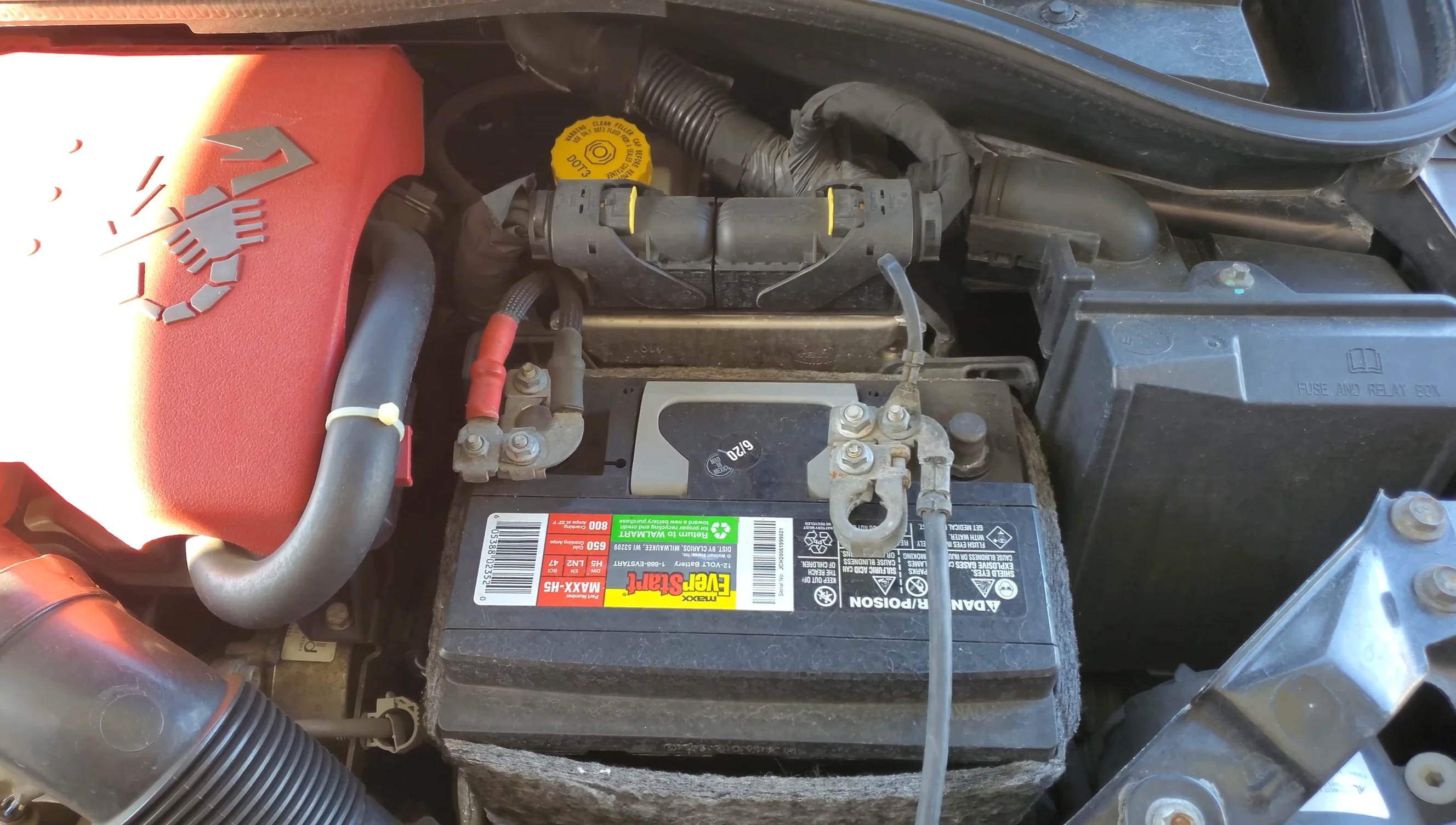 Close-up of battery showing age and date