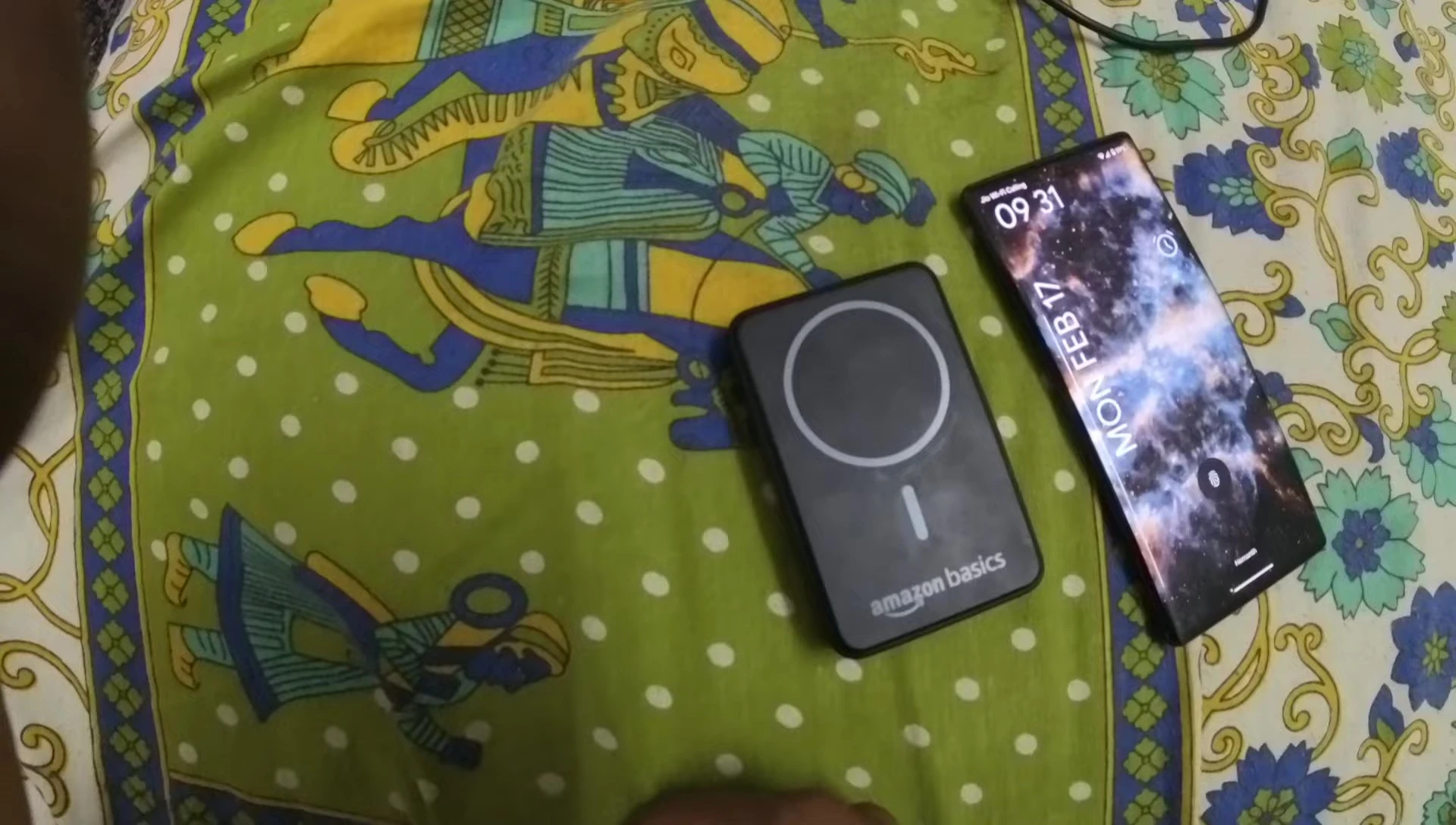 Power bank charging while simultaneously charging a device.