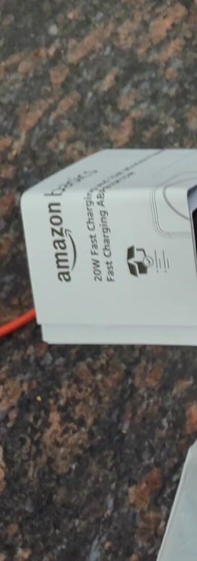 Close-up of the power bank's ports, highlighting USB-C and wireless charging capabilities.