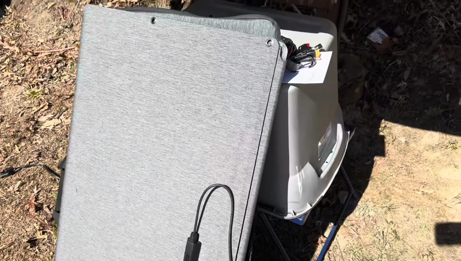 The folded panels in their carrying case.