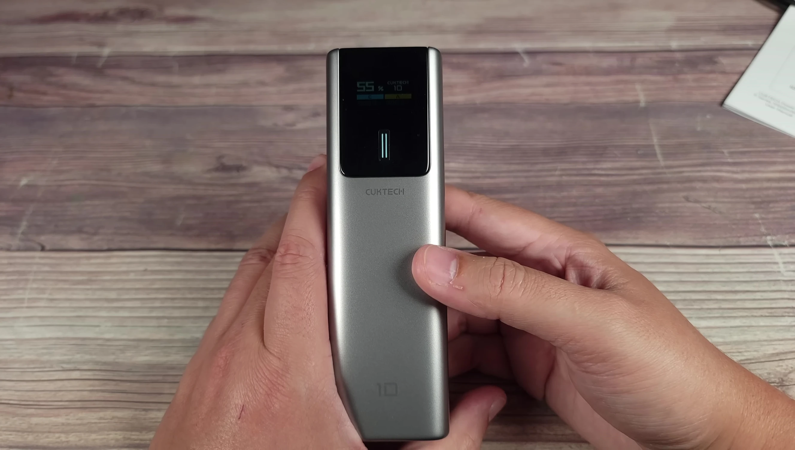 The CUKTECH 10 charging an iPhone.