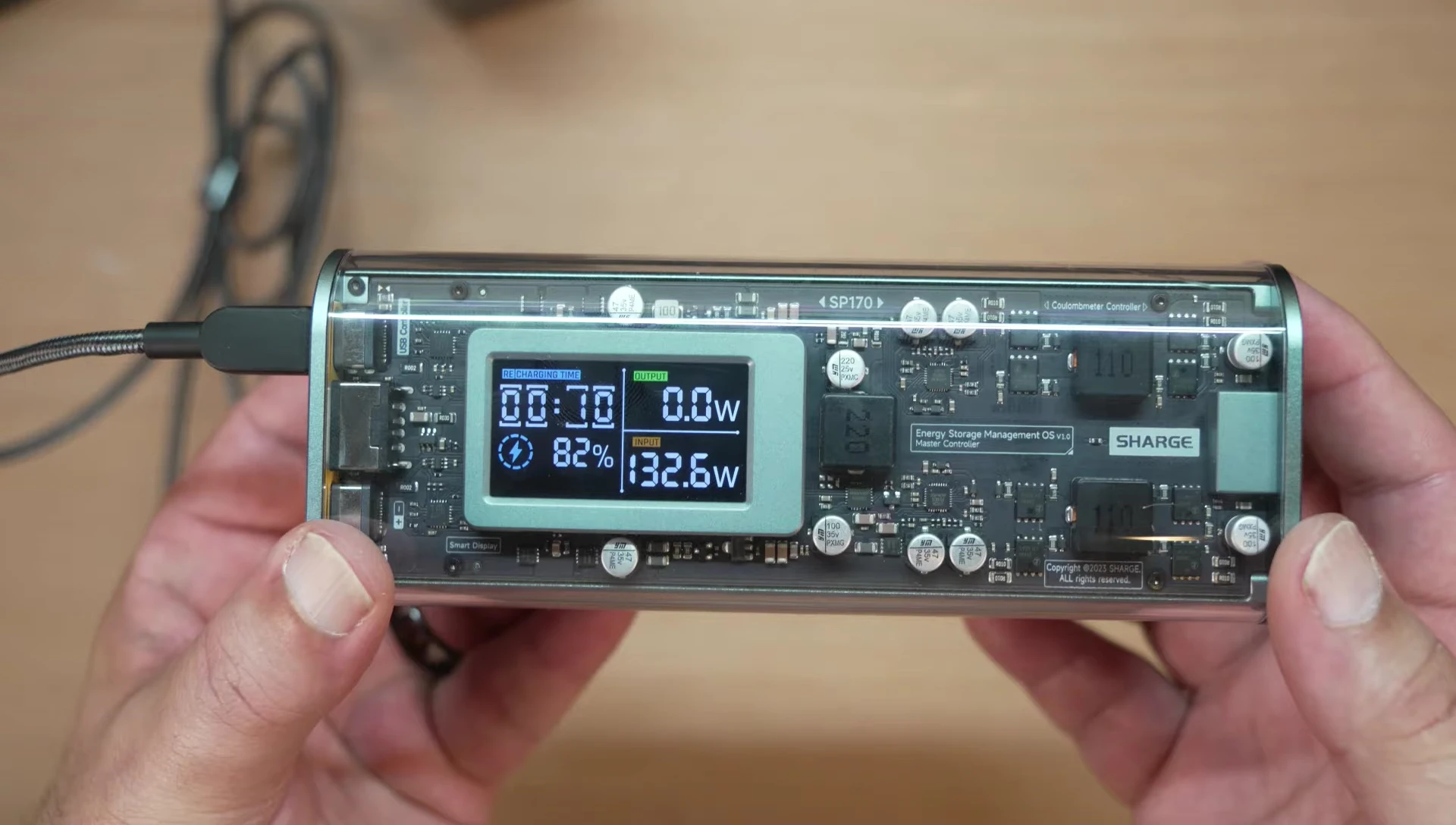 SH Geek 170 charging via another power bank.