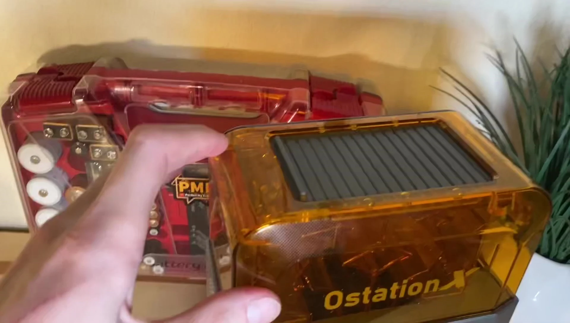 The dust cover opening to reveal the charging bays.