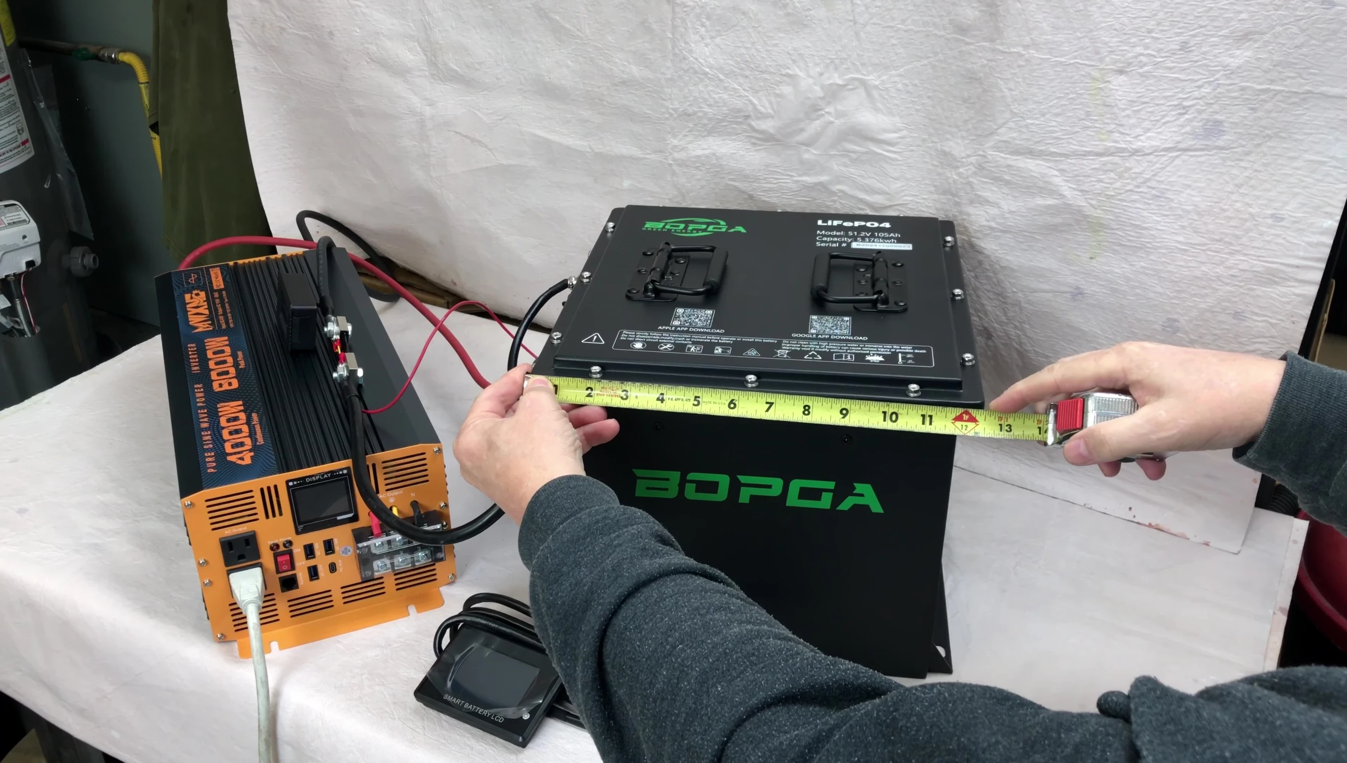 Measurements of the BOPGA MINI battery being taken.