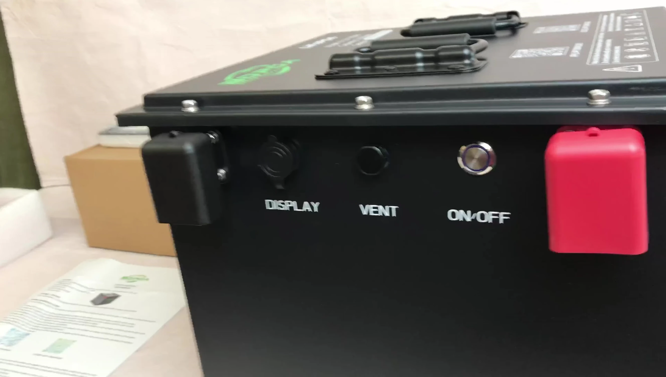 View of the battery's front, highlighting the connection covers.