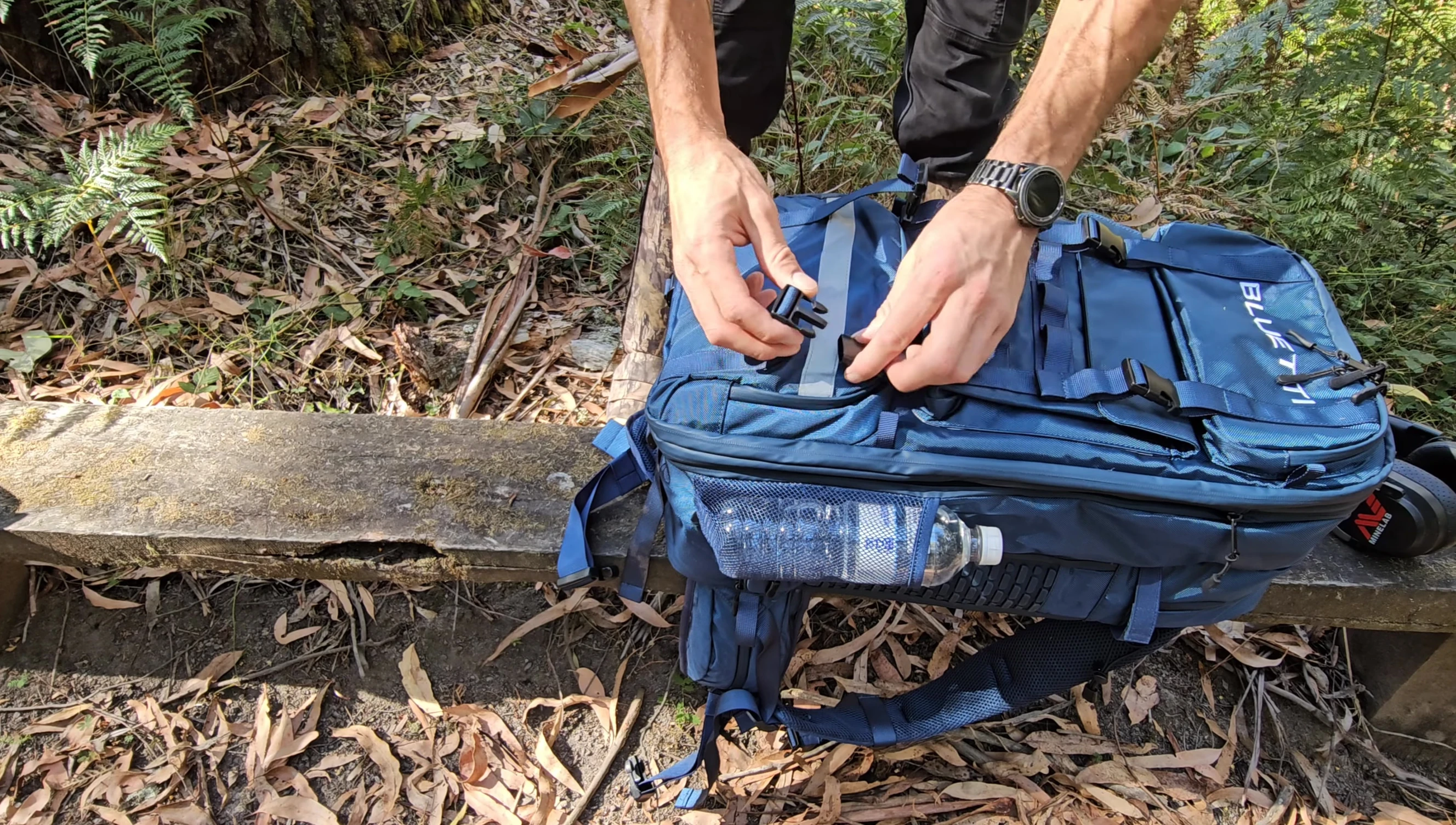 Exterior shot of the BLUETTI backpack open, showcasing its spacious interior and multiple compartments.