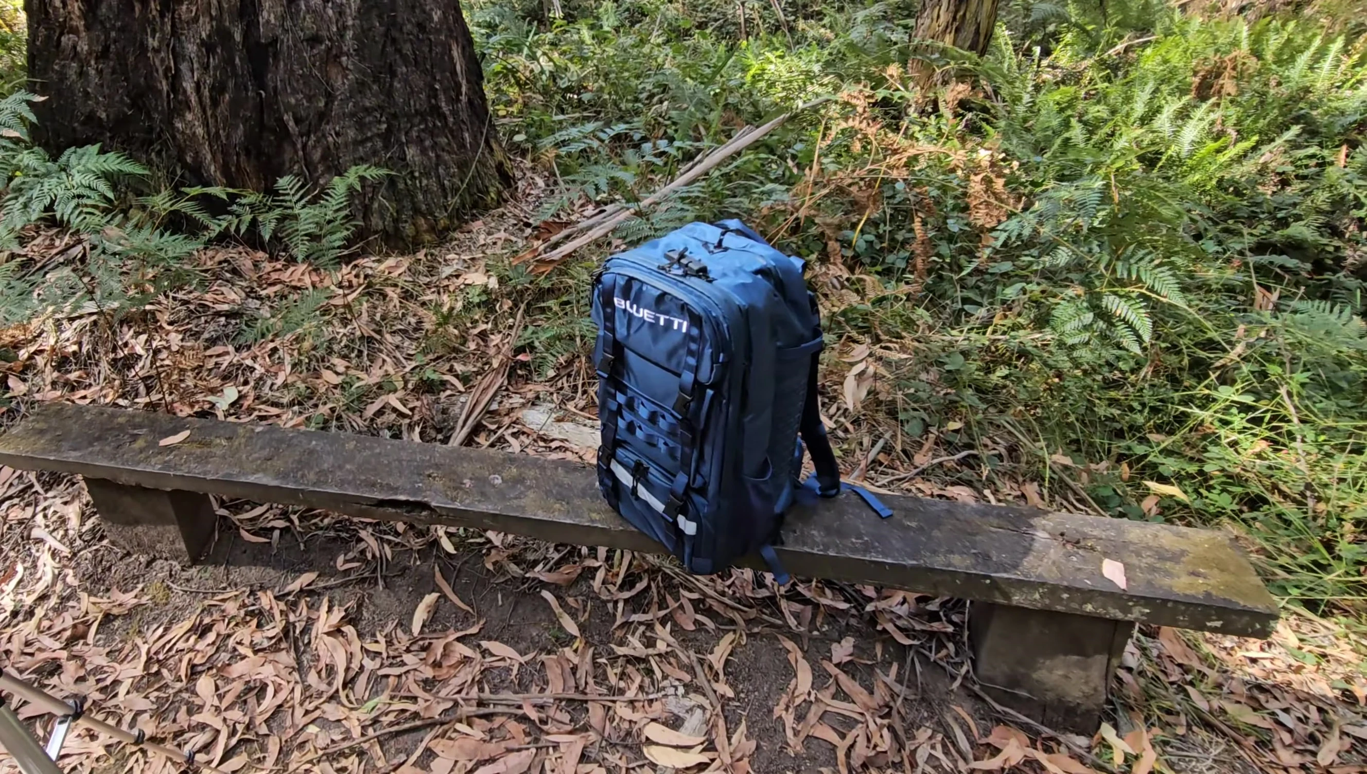 Final shot of the presenter with the BLUETTI backpack, summarizing the review.