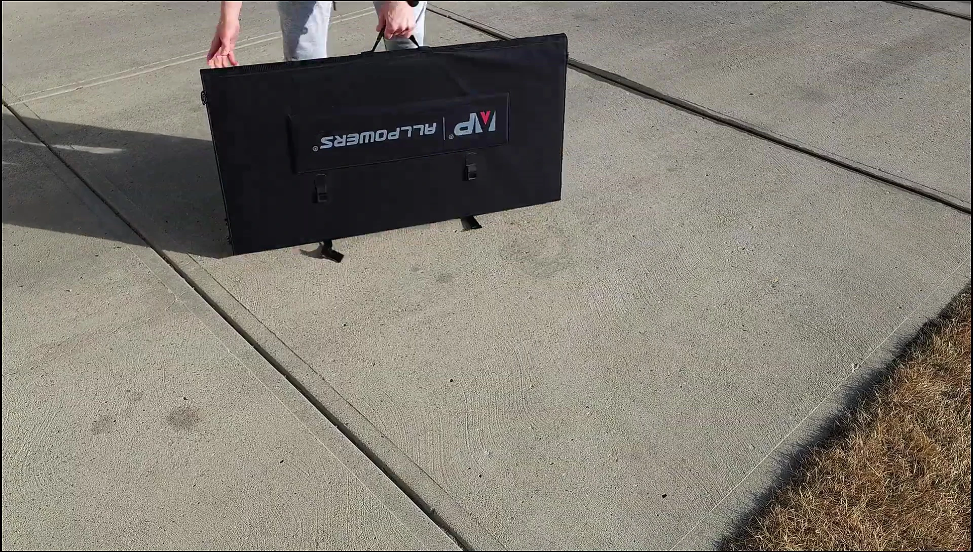 The solar panel being unfolded.