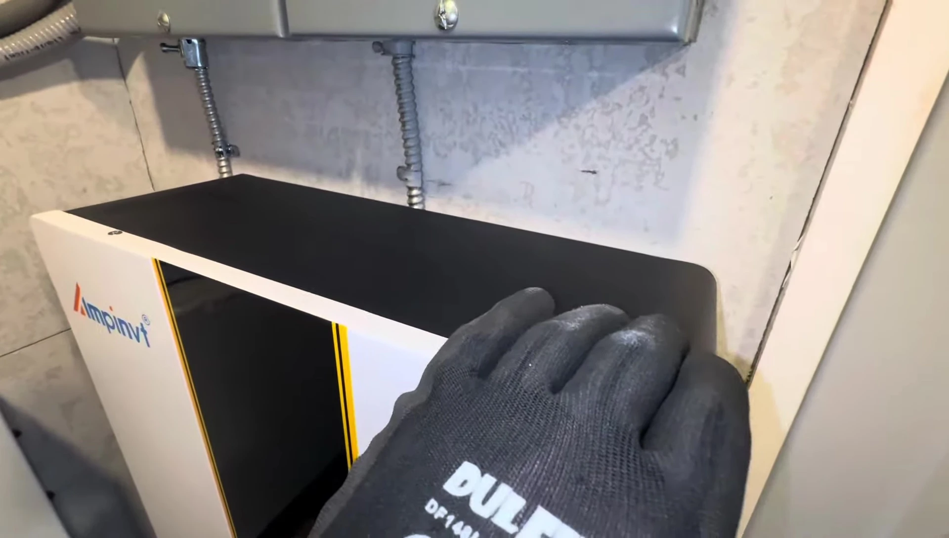 Ratchet straps used for securing the battery during installation.